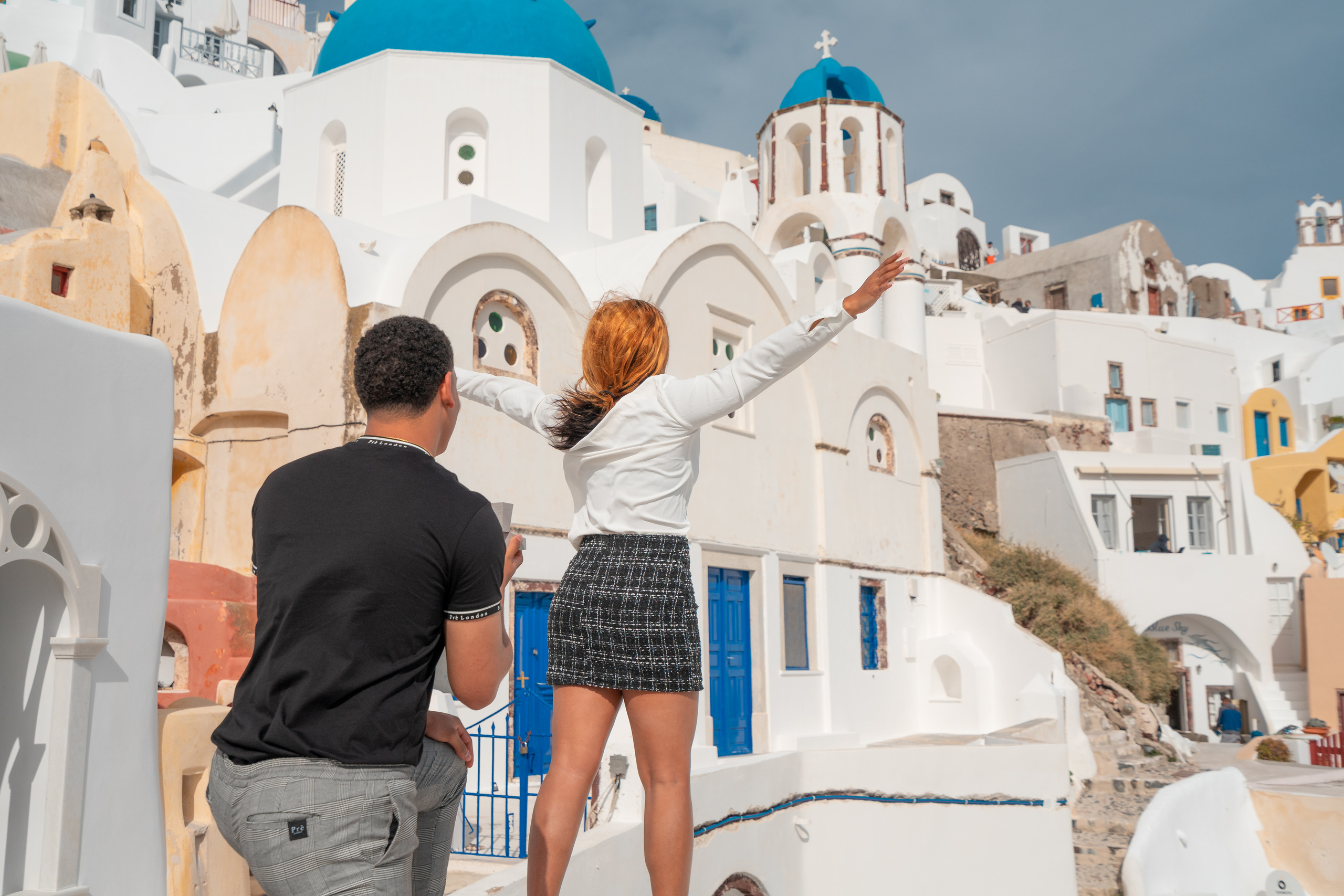 Romantic Proposal in Oia – The Perfect Santorini Engagement. Photographer in Santorini SokoLOVE Alex| Flying Dress Santorini