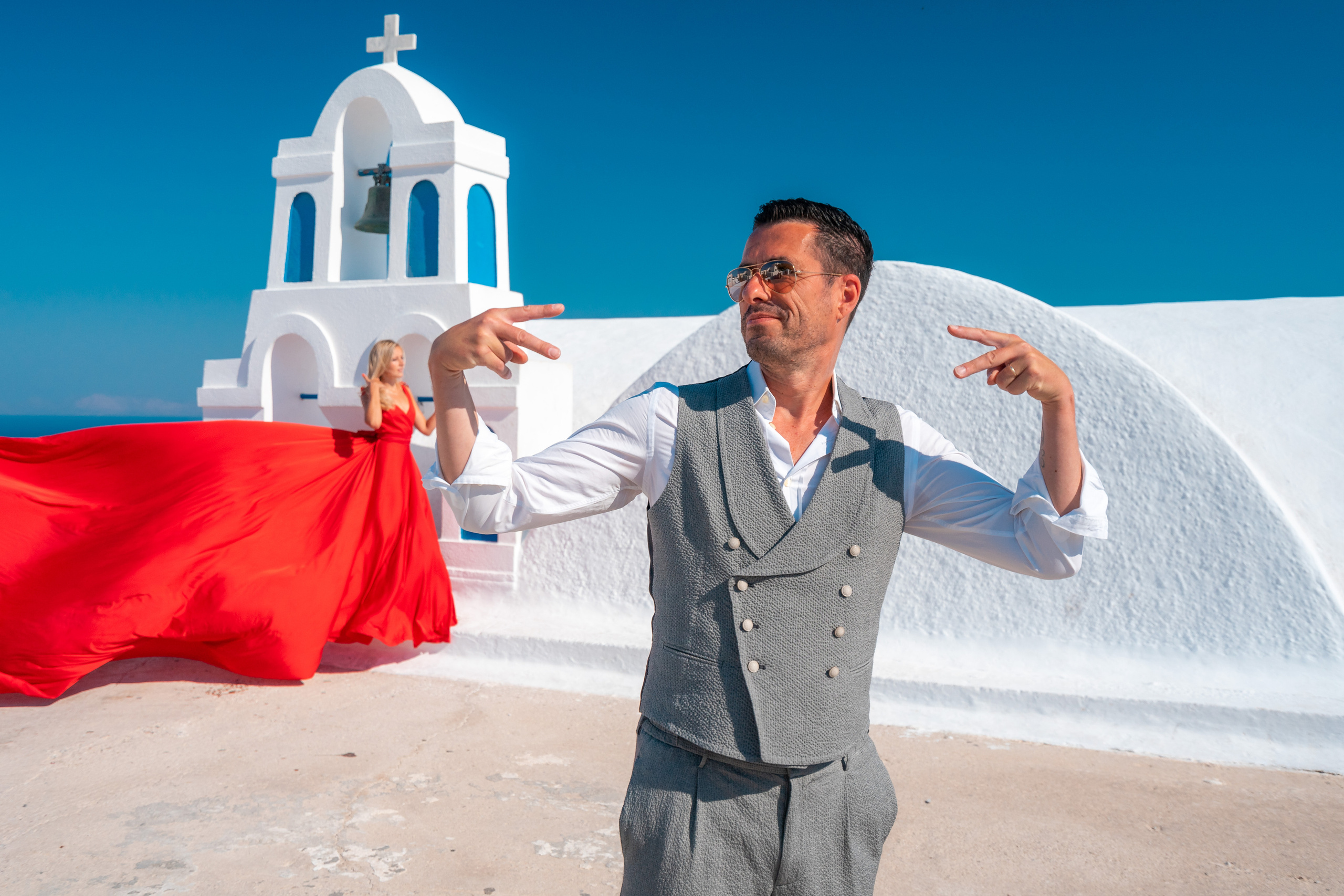 Wedding photographer in Santorini. Photographer in Santorini SokoLOVE Alex| Flying Dress Santorini
