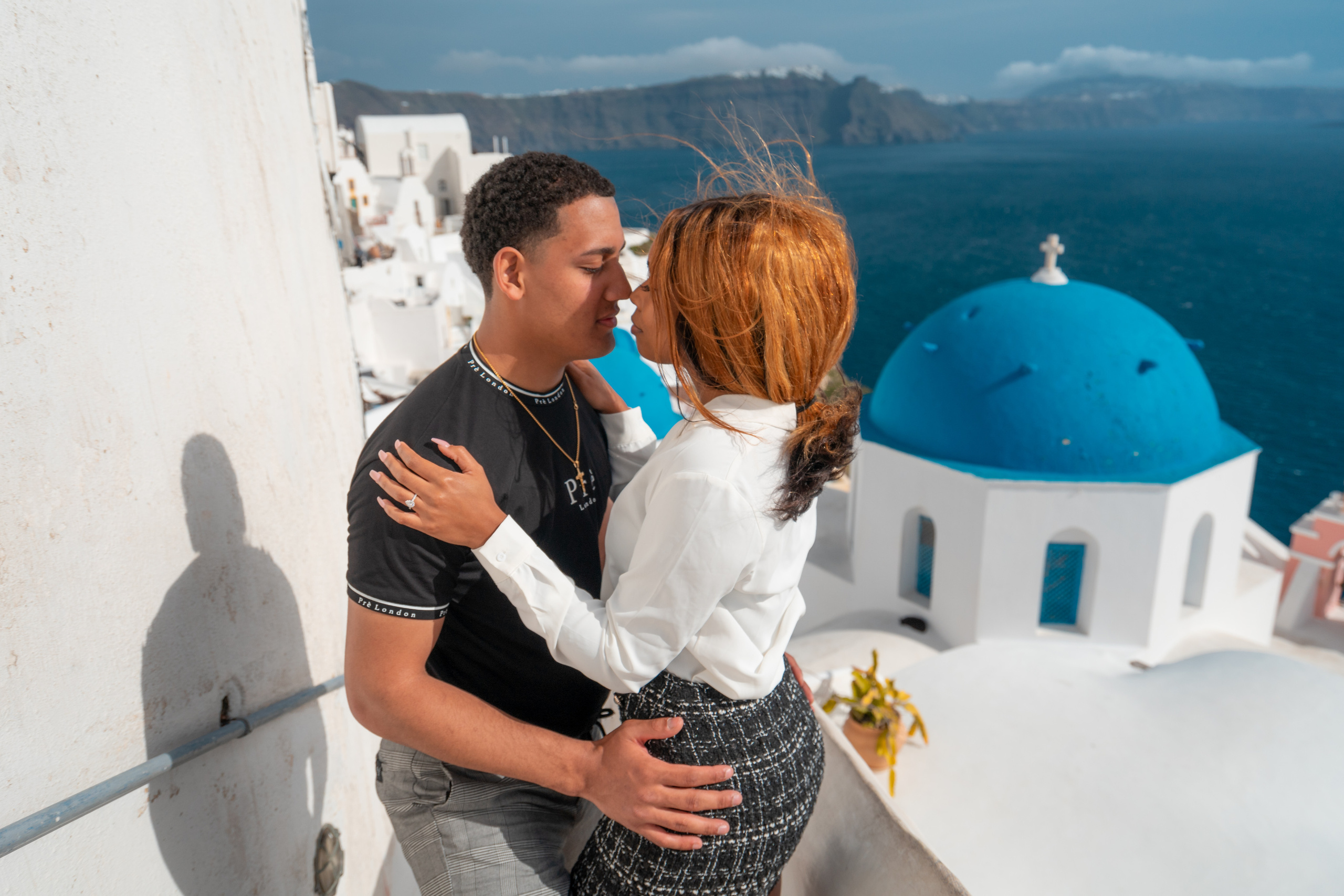 Romantic Proposal in Oia – The Perfect Santorini Engagement. Photographer in Santorini SokoLOVE Alex| Flying Dress Santorini