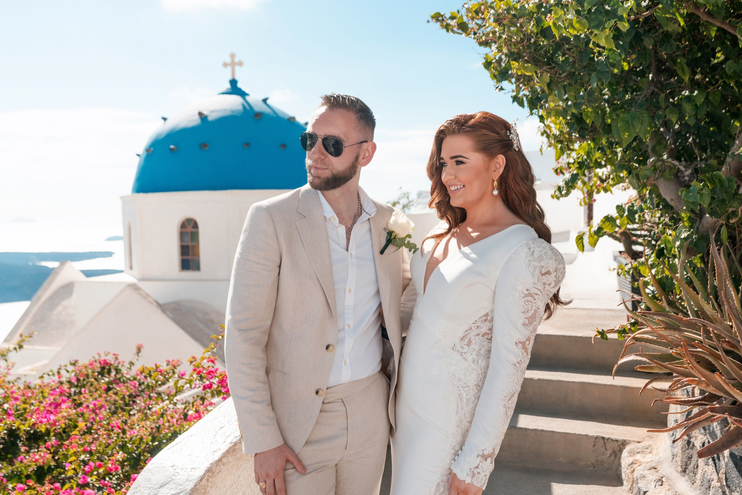 Wedding photo shoot in Imerovigli. Flying Dress Santorini Photographer | SokoLOVE — Book 2026