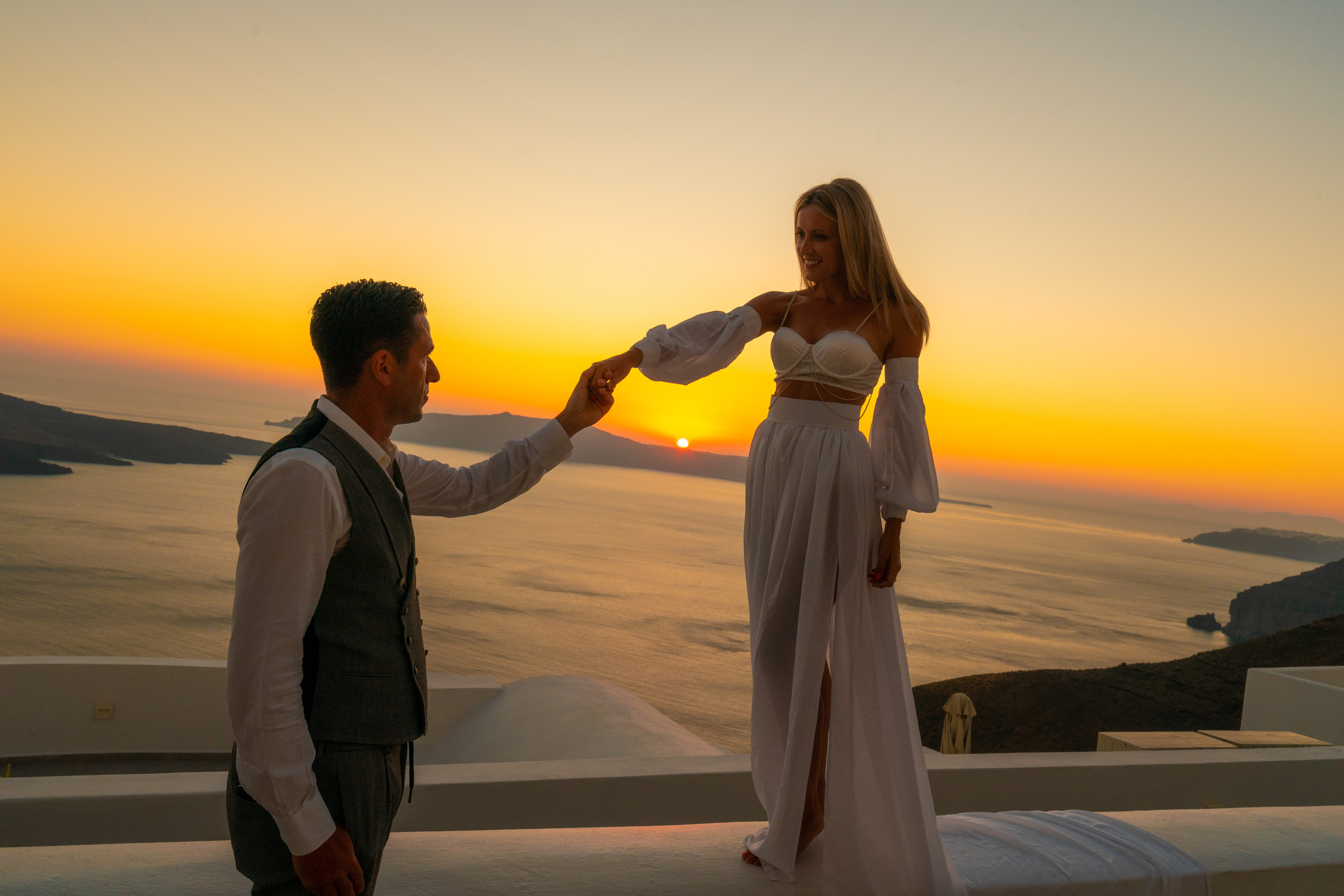 Wedding photographer in Santorini. Photographer in Santorini SokoLOVE Alex| Flying Dress Santorini