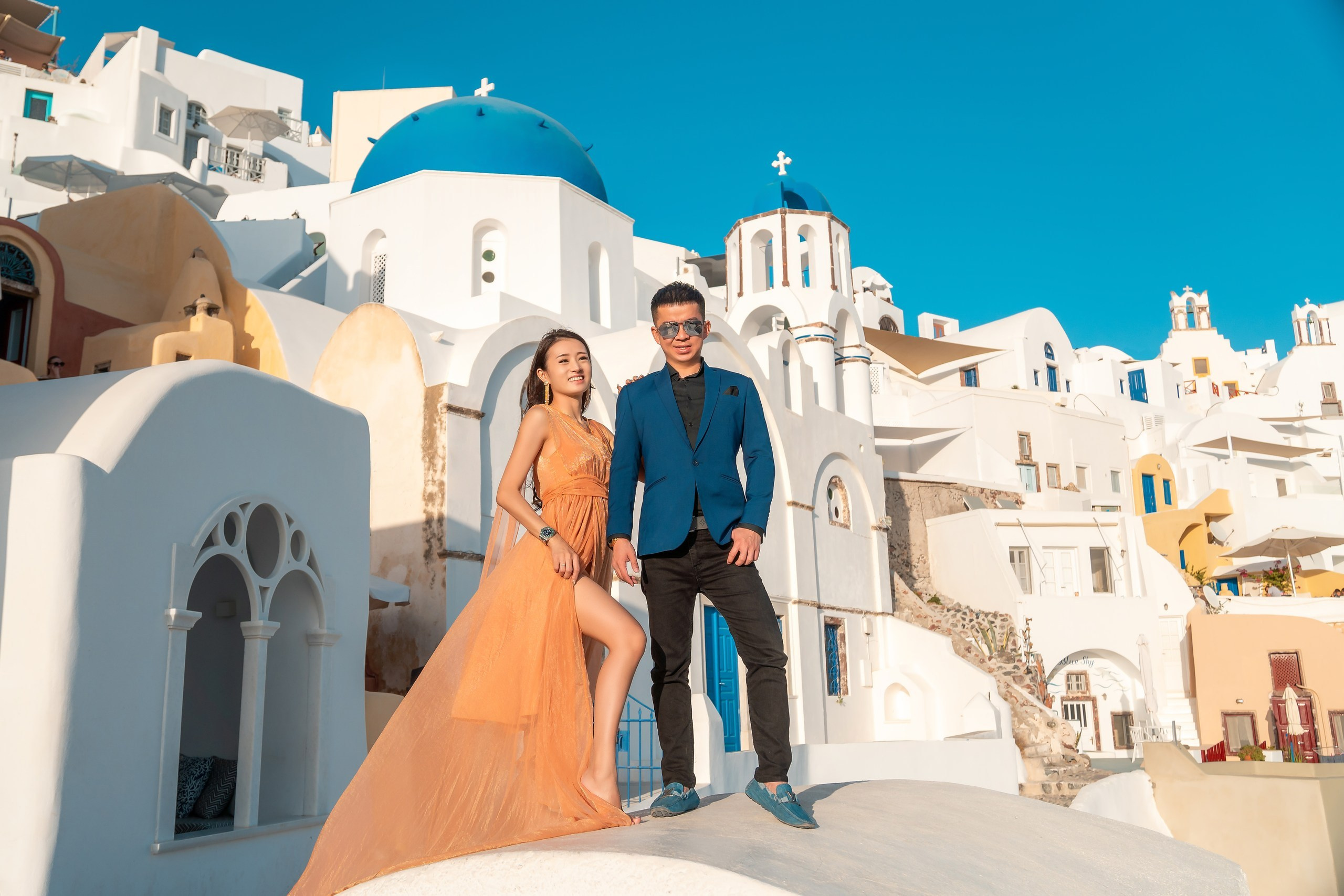 Photoshooting in Santorini, Oia. Photographer in Santorini SokoLOVE Alex| Flying Dress Santorini