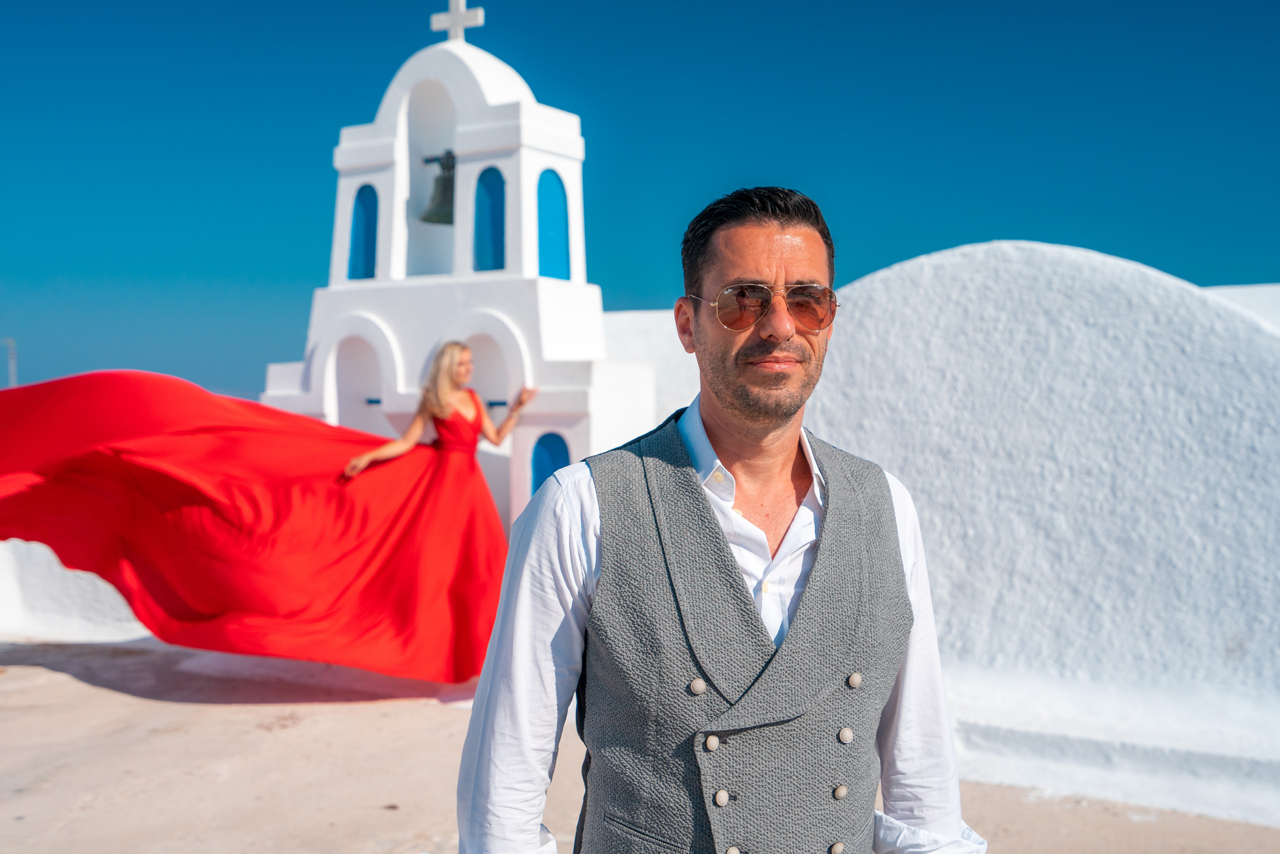 Wedding photographer in Santorini. Photographer in Santorini SokoLOVE Alex| Flying Dress Santorini