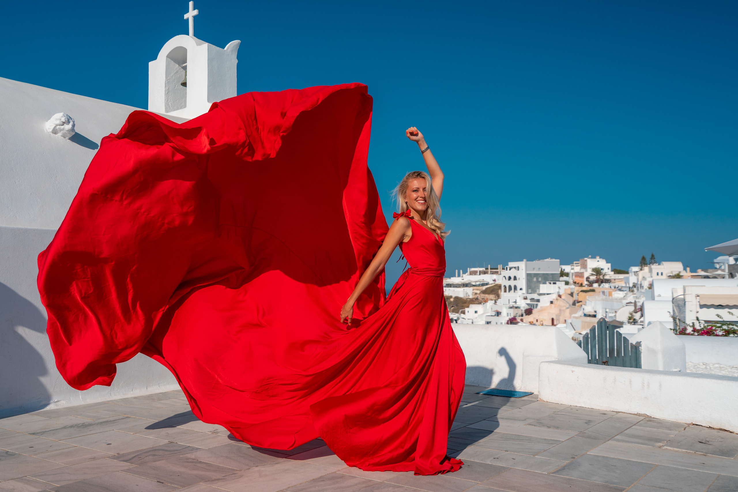 Wedding photographer in Santorini. Photographer in Santorini SokoLOVE Alex| Flying Dress Santorini