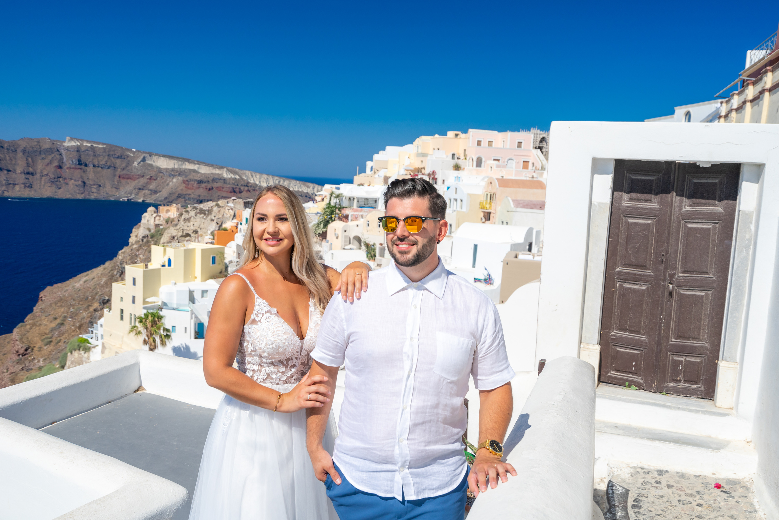 Wedding photographer in Santorini. Photographer in Santorini SokoLOVE Alex| Flying Dress Santorini