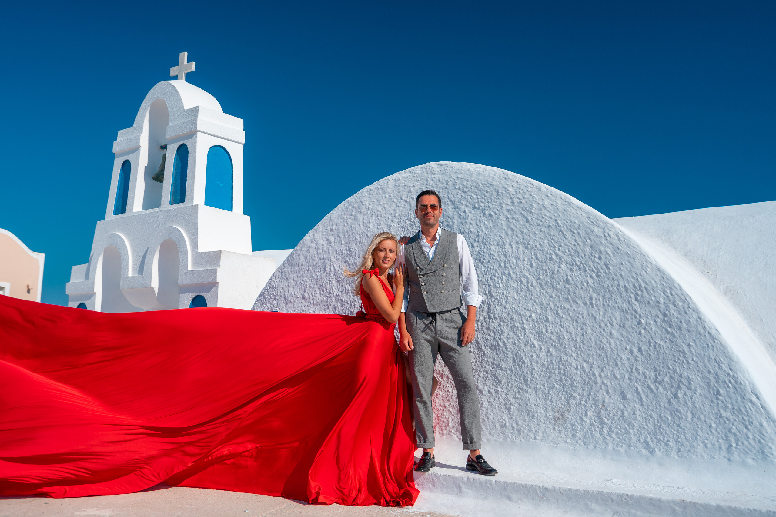 Wedding photographer in Santorini. Photographer in Santorini SokoLOVE Alex| Flying Dress Santorini