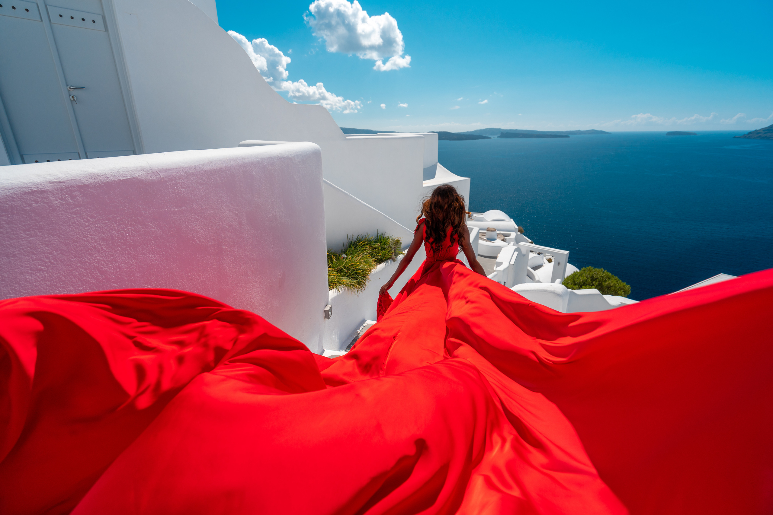 red  flying dress Santorini