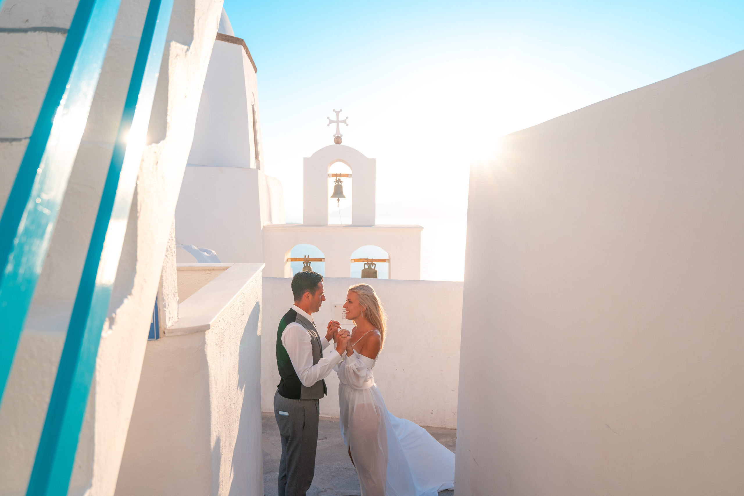 Wedding photographer in Santorini. Photographer in Santorini SokoLOVE Alex| Flying Dress Santorini