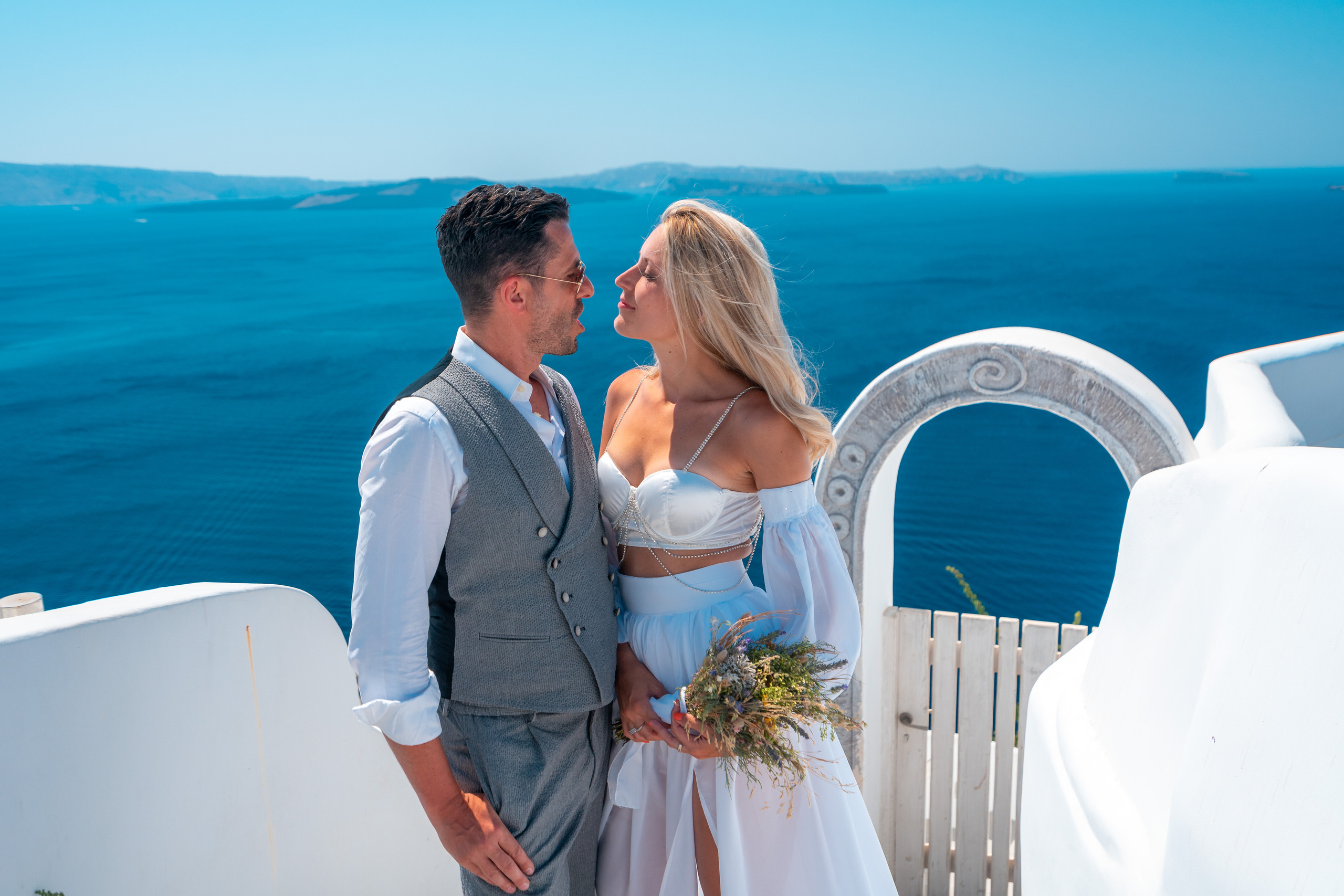 Wedding photographer in Santorini. Photographer in Santorini SokoLOVE Alex| Flying Dress Santorini