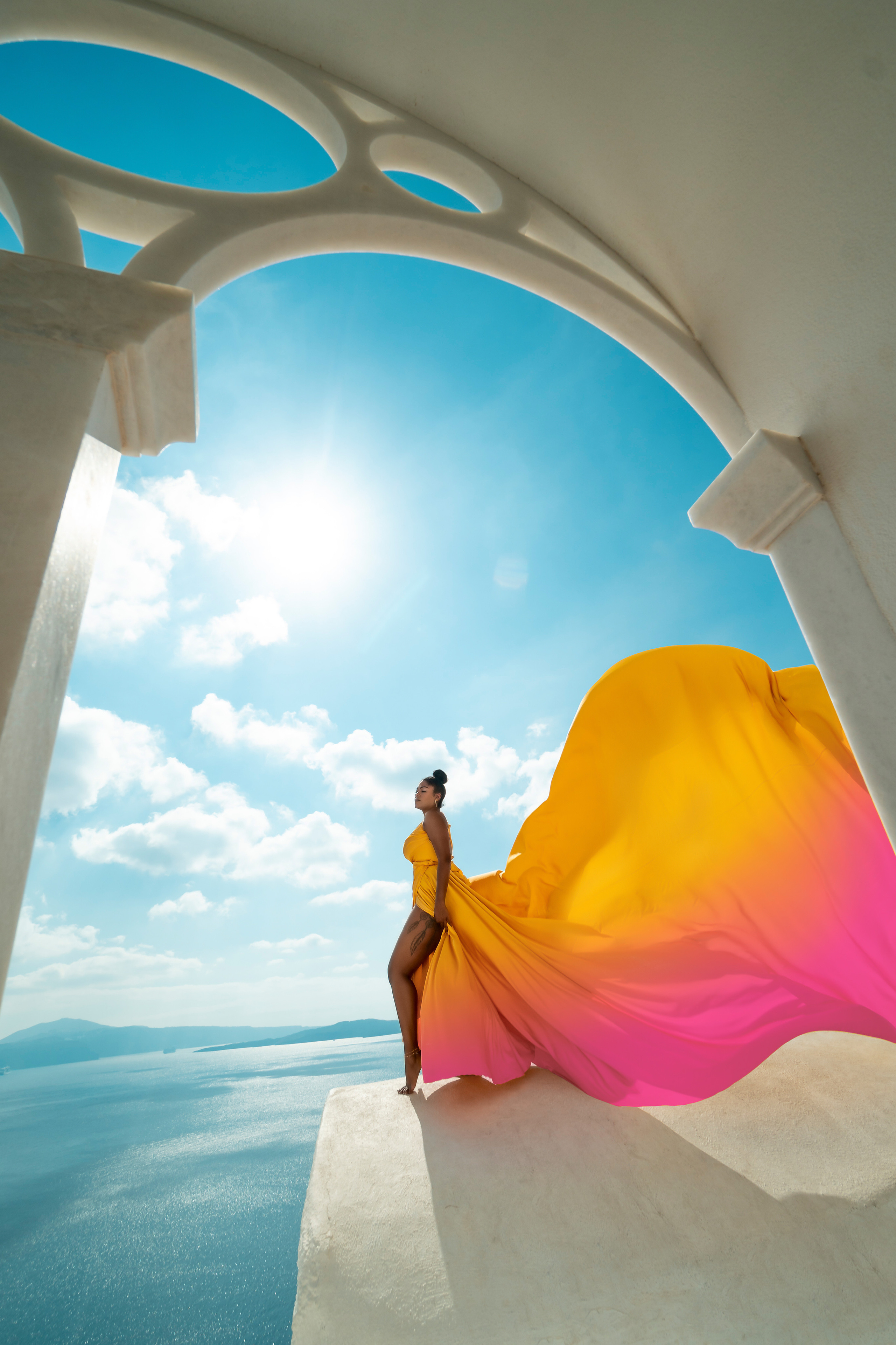 Bring vibrant elegance to your photoshoot with Sokolove’s yellow flying dress. Featuring a beautiful bare-back design, it’s available in sizes XS-L to create stunning, flowing imagery.