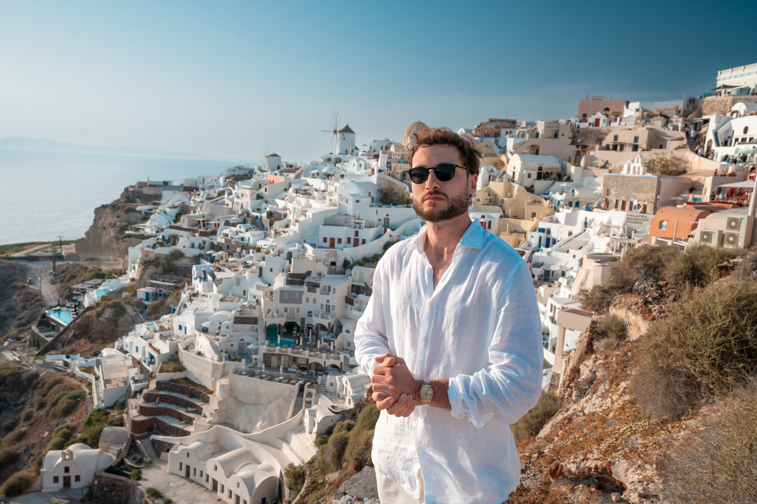 Let Sokolove capture your elegance in Santorini with a bespoke portrait photoshoot for men. Our expert photographers will create striking portraits set against the island's breathtaking views, offering a timeless and sophisticated look