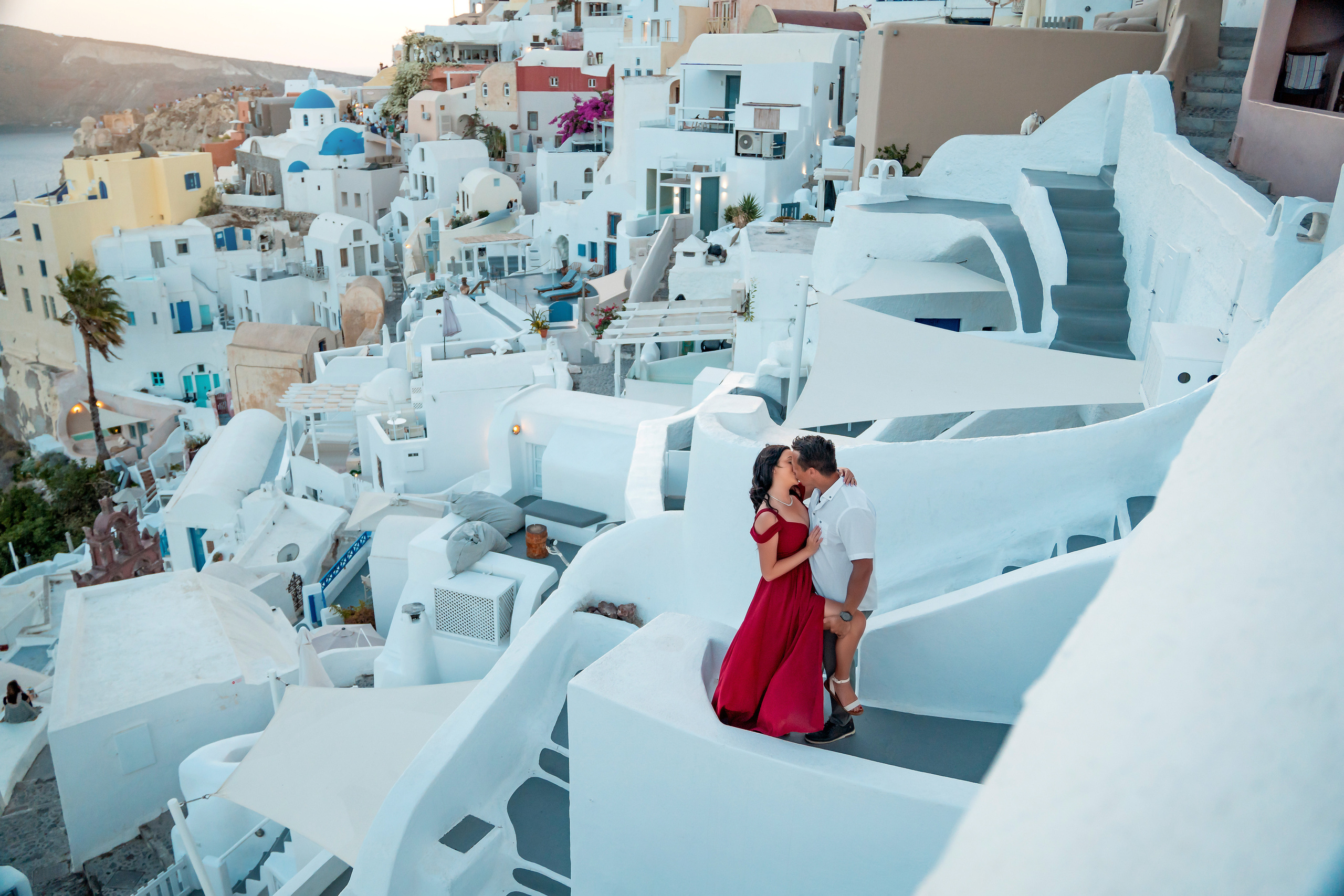 Couple photo session in Santorini, Oia. Photographer in Santorini SokoLOVE Alex| Flying Dress Santorini