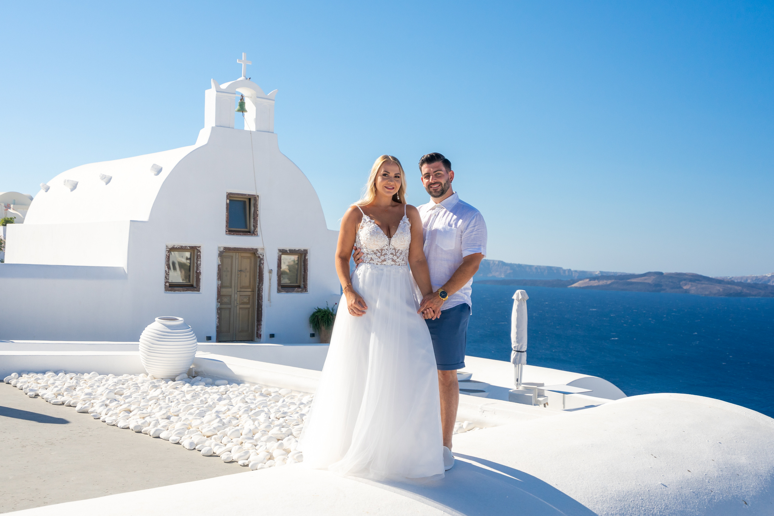 Wedding photographer in Santorini. Photographer in Santorini SokoLOVE Alex| Flying Dress Santorini