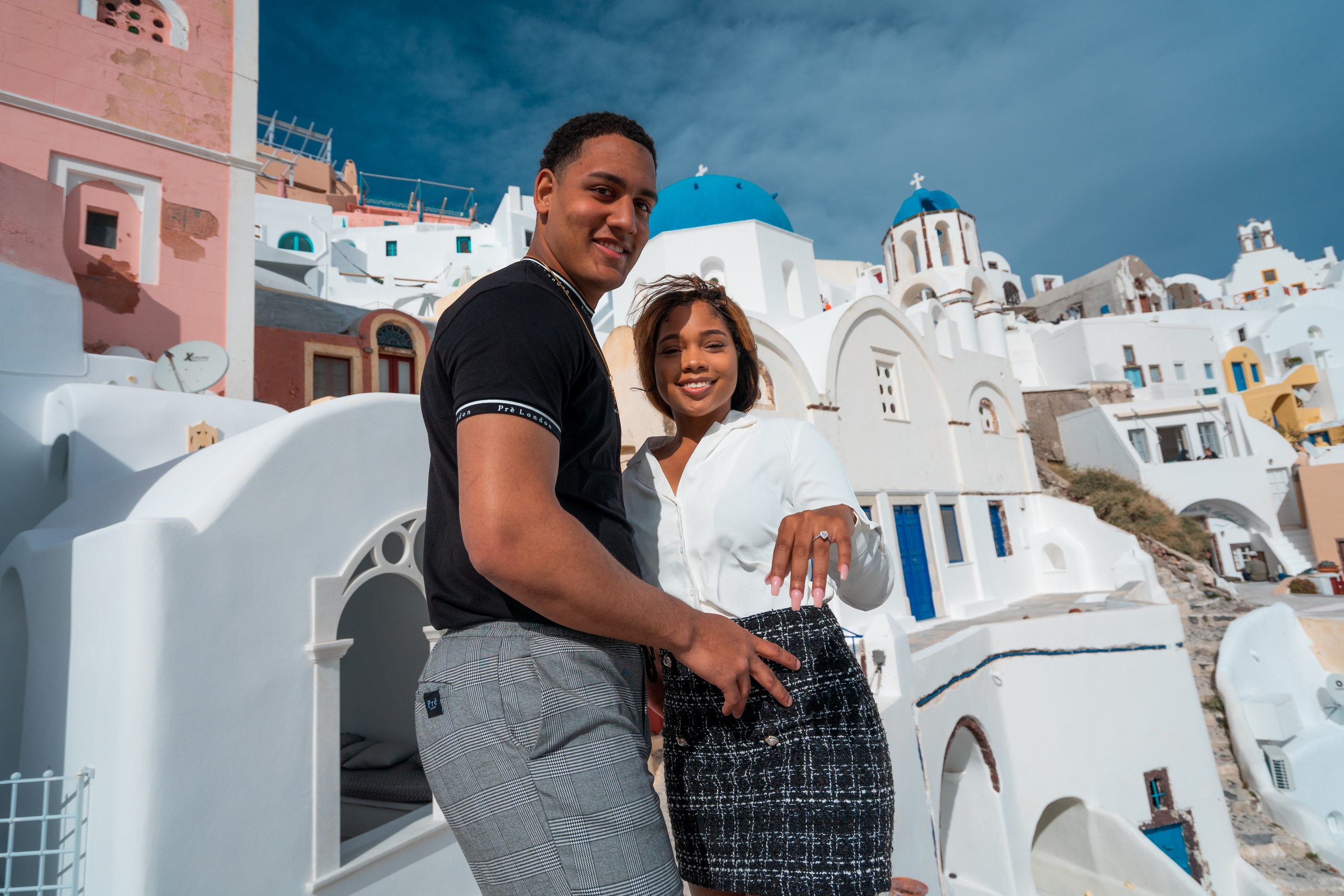 Romantic Proposal in Oia – The Perfect Santorini Engagement. Photographer in Santorini SokoLOVE Alex| Flying Dress Santorini