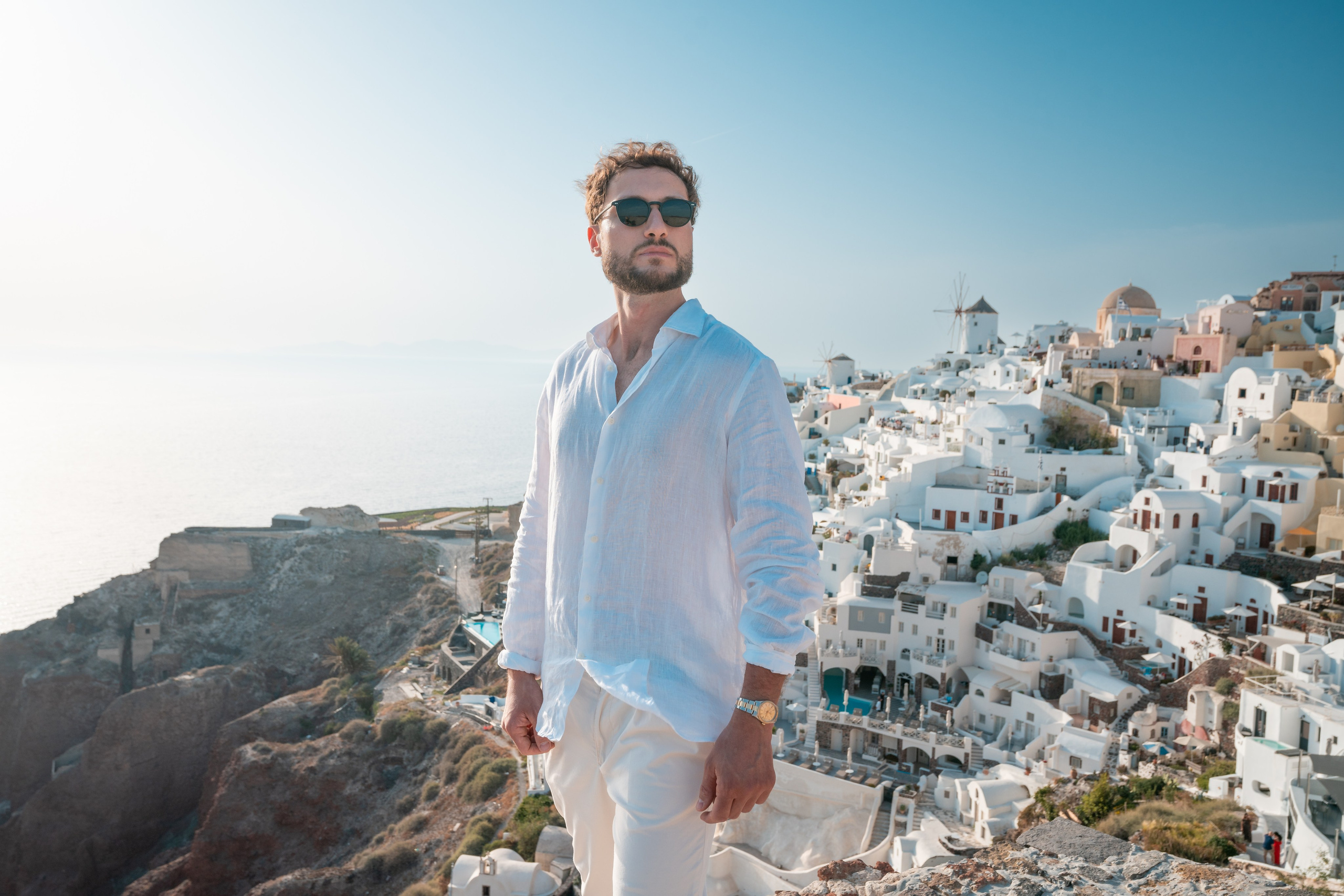 Experience the art of portrait photography in Santorini with Sokolove. Our men's portrait photoshoots capture your elegance amidst the island's picturesque landscapes, creating powerful and refined images that showcase your true style.