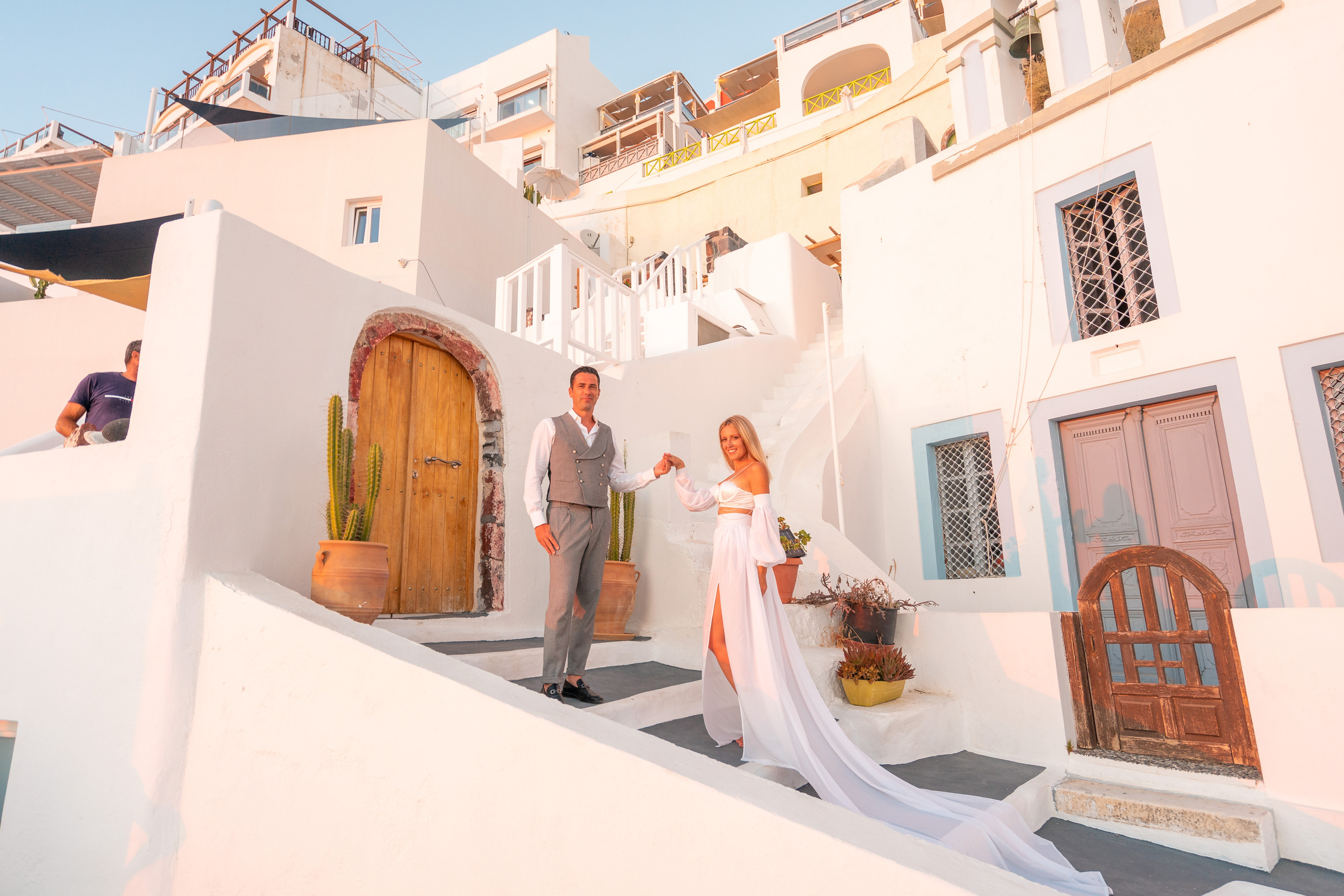 Wedding photographer in Santorini. Photographer in Santorini SokoLOVE Alex| Flying Dress Santorini