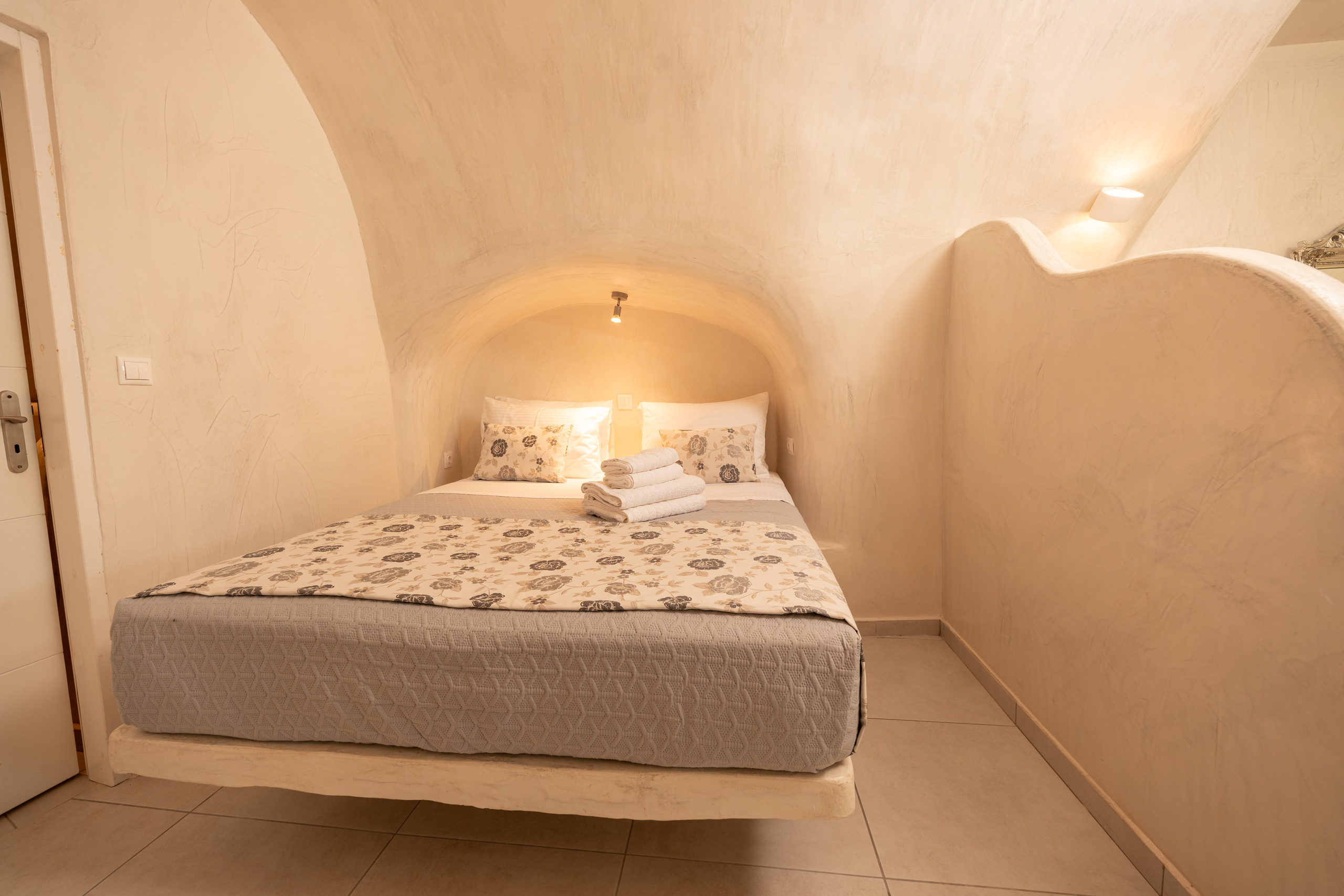 Hotel caves in Oia. Flying Dress Santorini Photographer | SokoLOVE — Book 2026