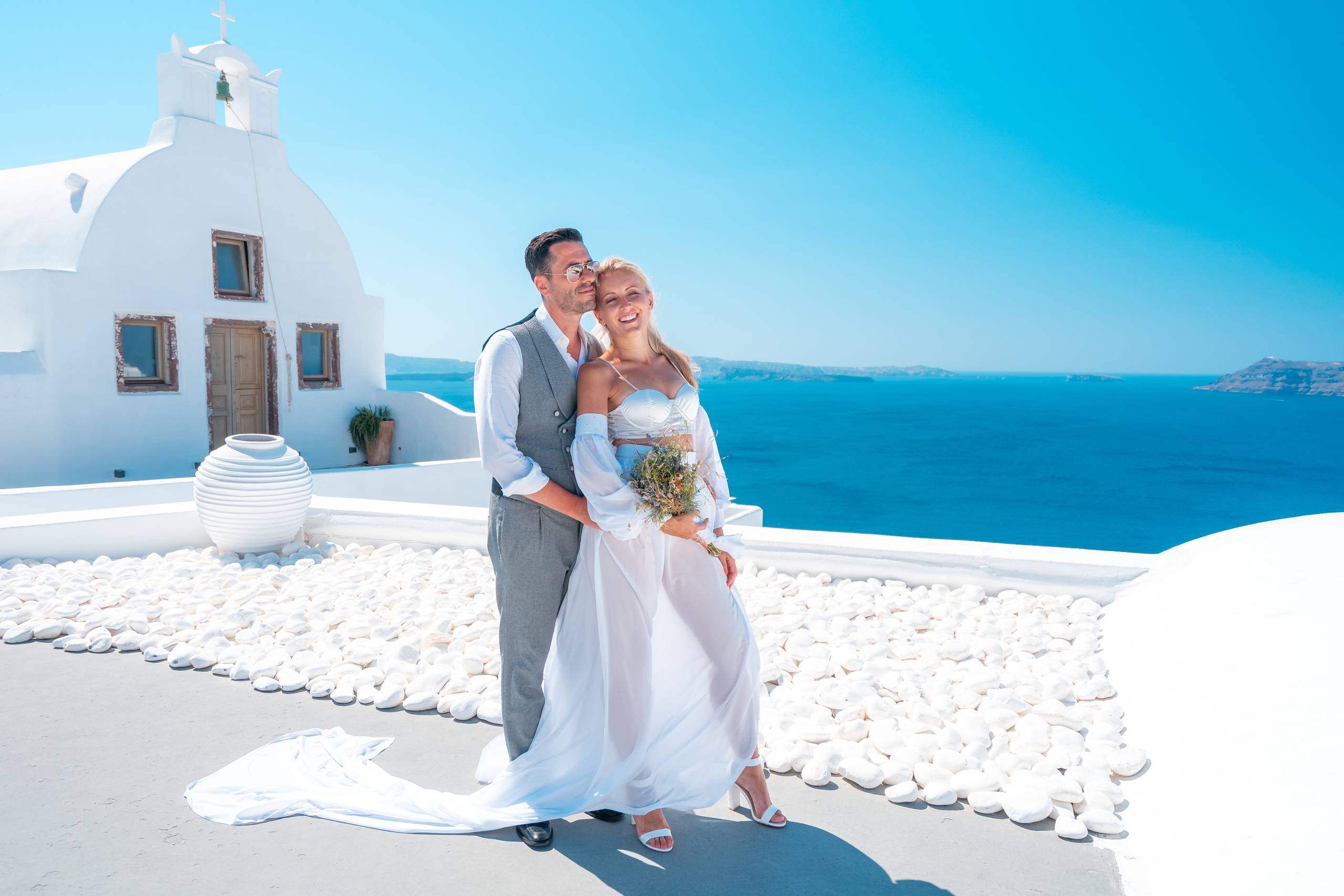 Wedding photographer in Santorini. Photographer in Santorini SokoLOVE Alex| Flying Dress Santorini