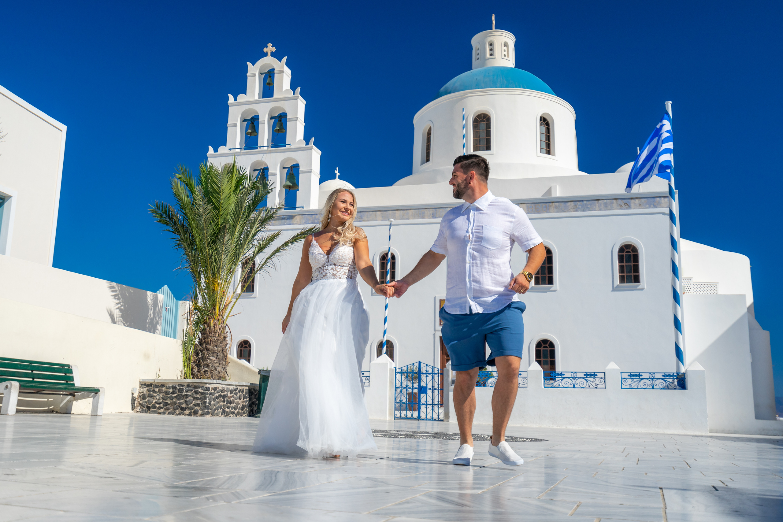Wedding photographer in Santorini. Photographer in Santorini SokoLOVE Alex| Flying Dress Santorini
