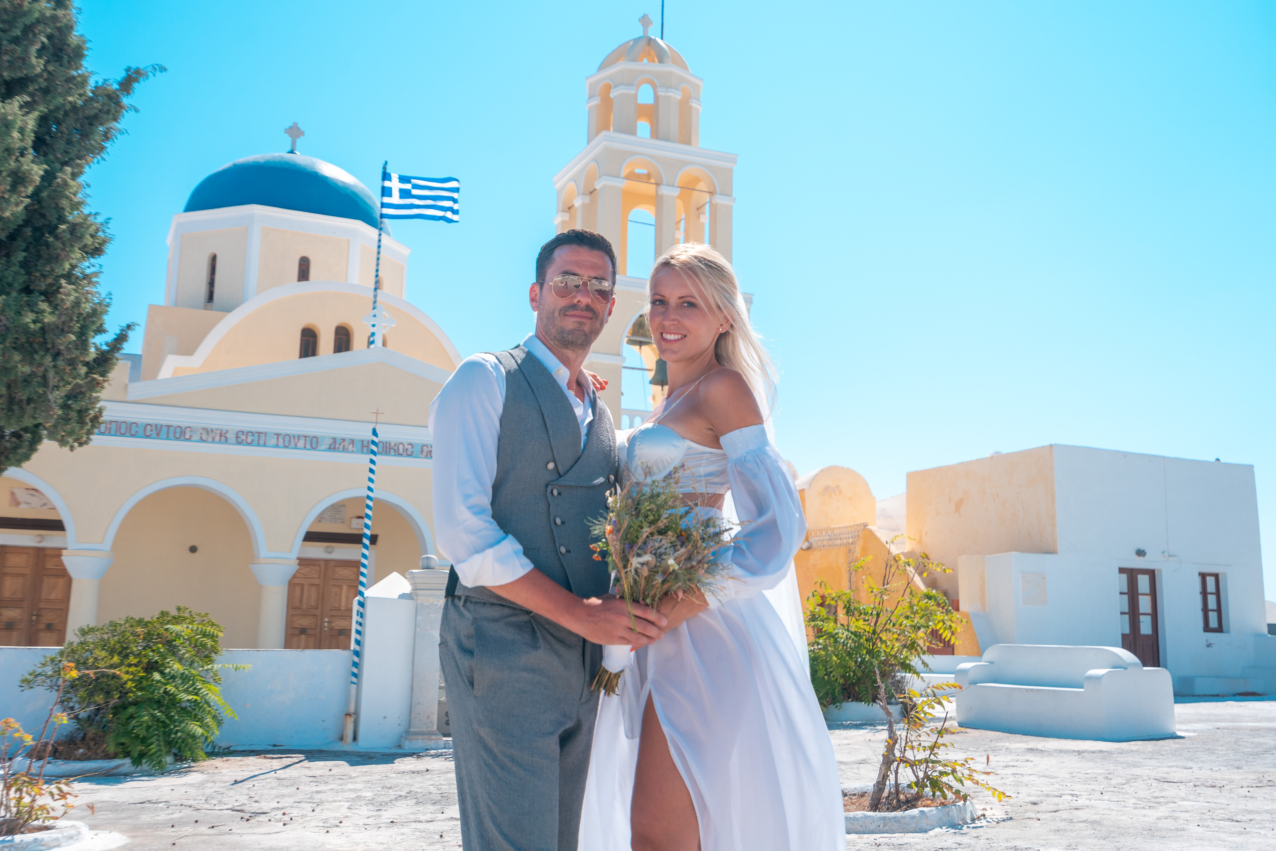 Wedding photographer in Santorini. Photographer in Santorini SokoLOVE Alex| Flying Dress Santorini