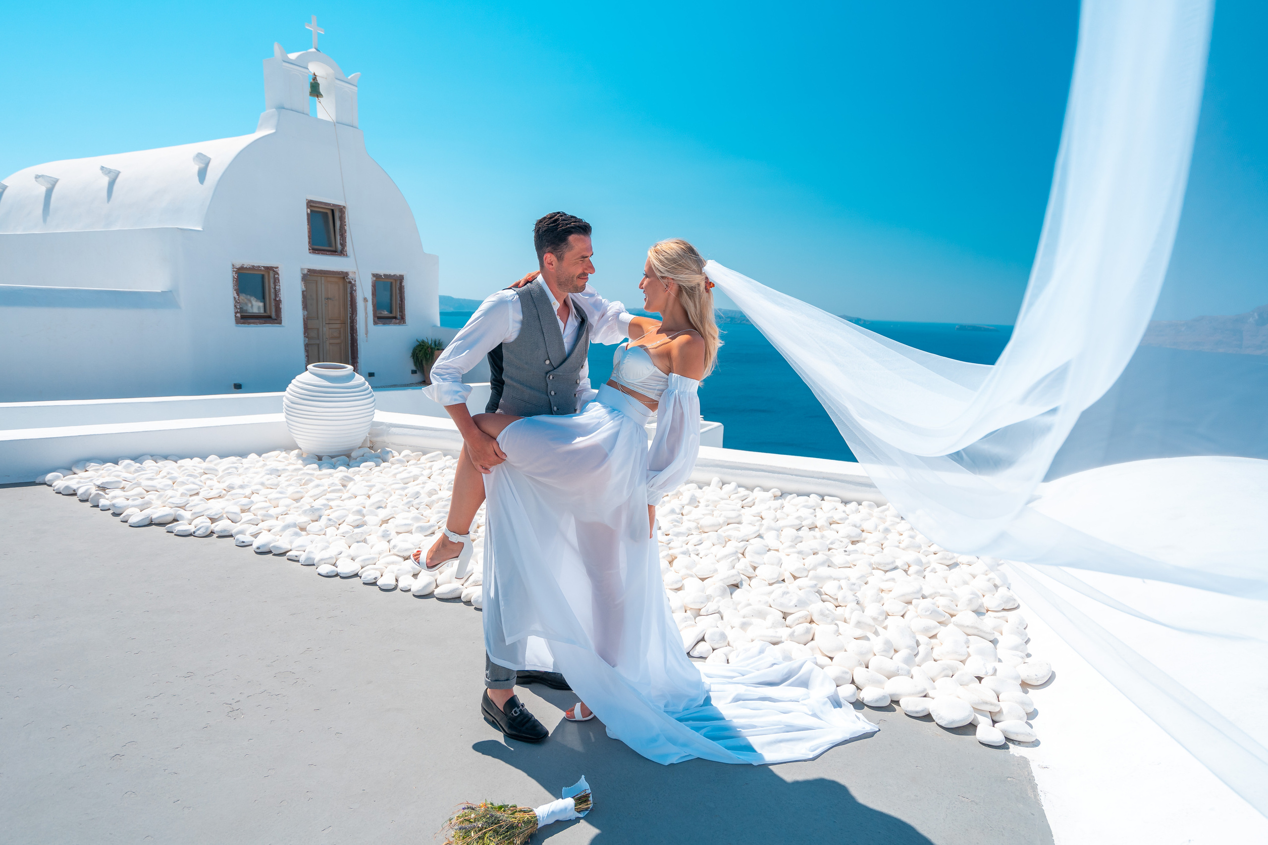 Wedding photographer in Santorini. Photographer in Santorini SokoLOVE Alex| Flying Dress Santorini
