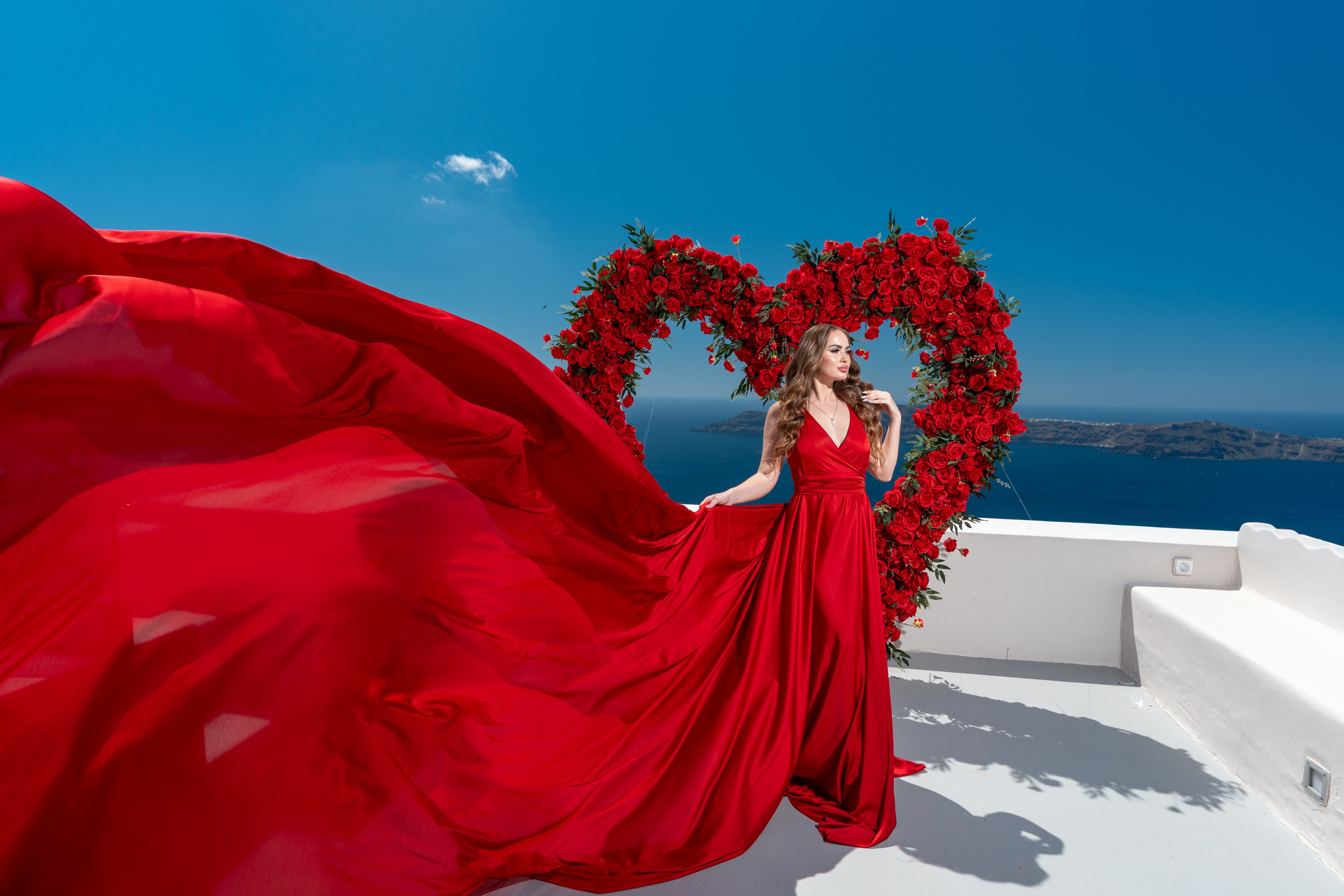 Here are SEO-optimized title and description options for a hotel focused on wedding events and proposals in Imerovigli, Santorini. Flying Dress Santorini Photographer | SokoLOVE — Book 2026