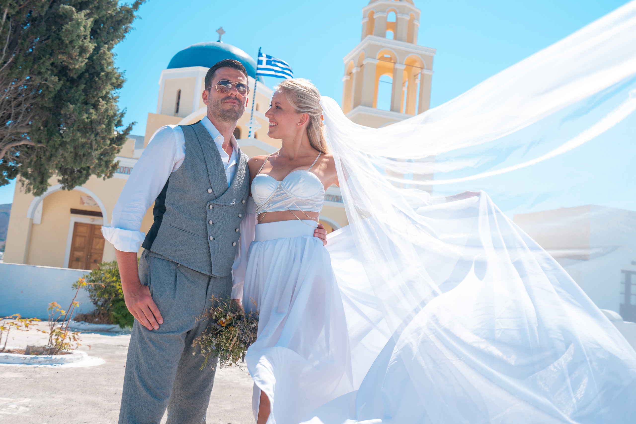 Wedding photographer in Santorini. Photographer in Santorini SokoLOVE Alex| Flying Dress Santorini