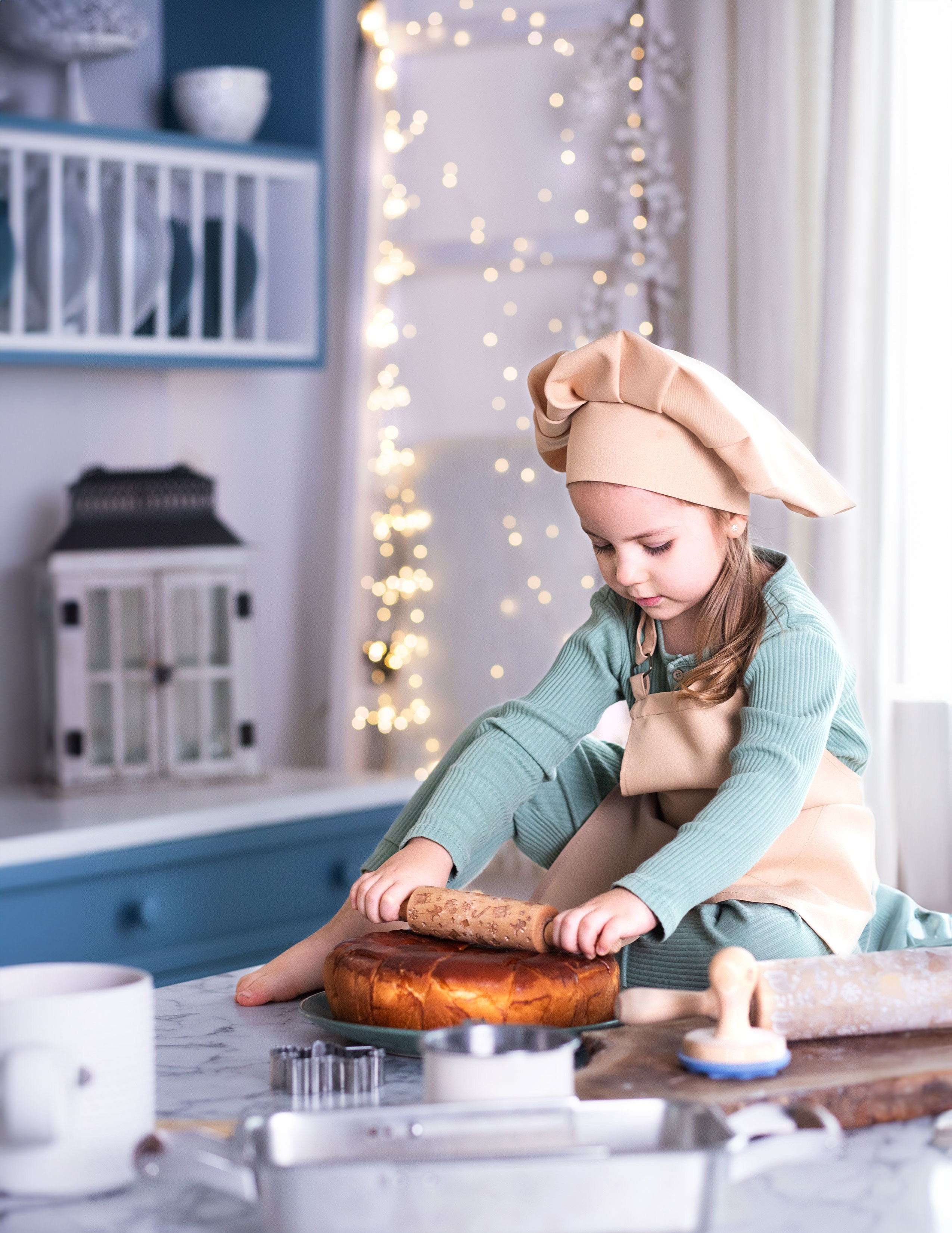 Новорічна сімейна фотозйомка «Свята починаються з кухні». Сімейний та дитячий фотограф Київ, Ірпінь, Буча — Галина Пивоварова