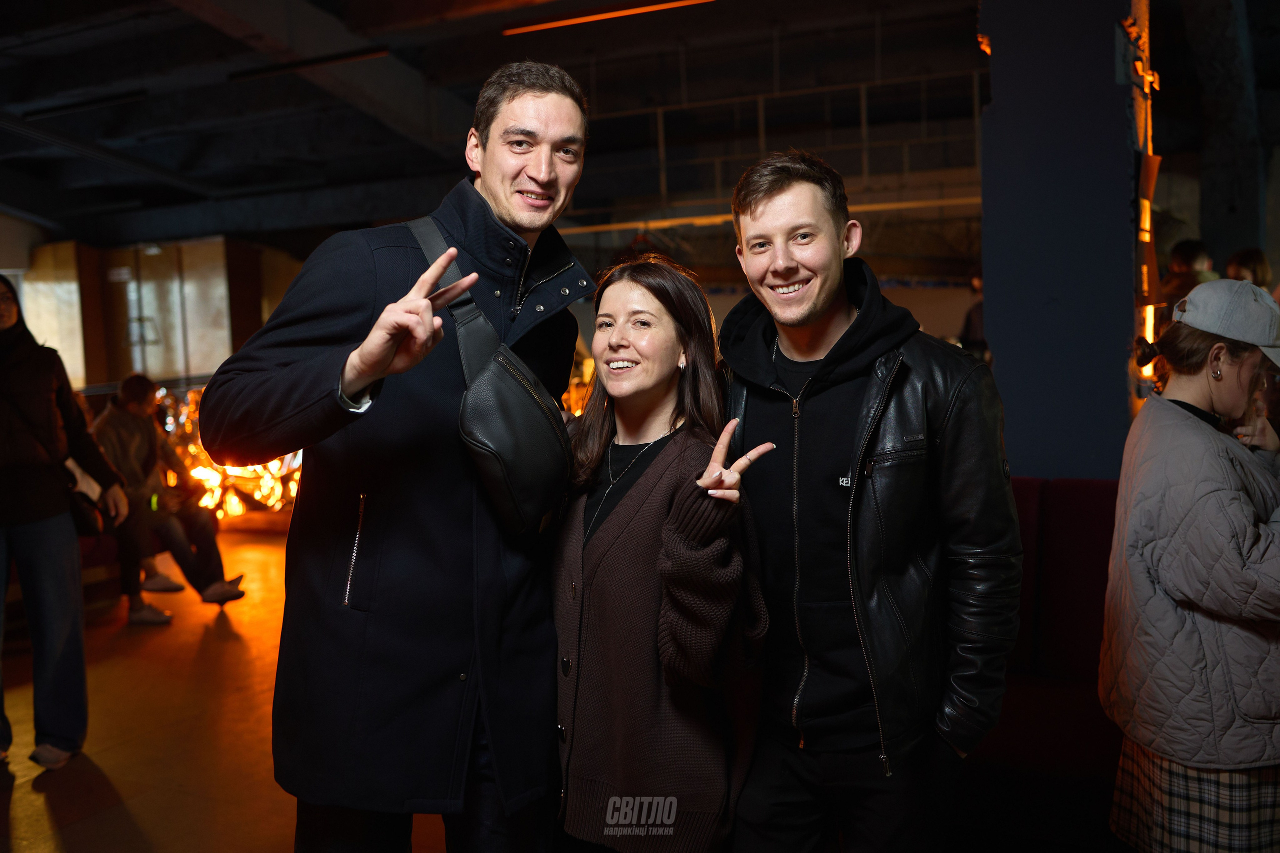 Фотограф фиксирует живые эмоции участников конференции в Днепре.