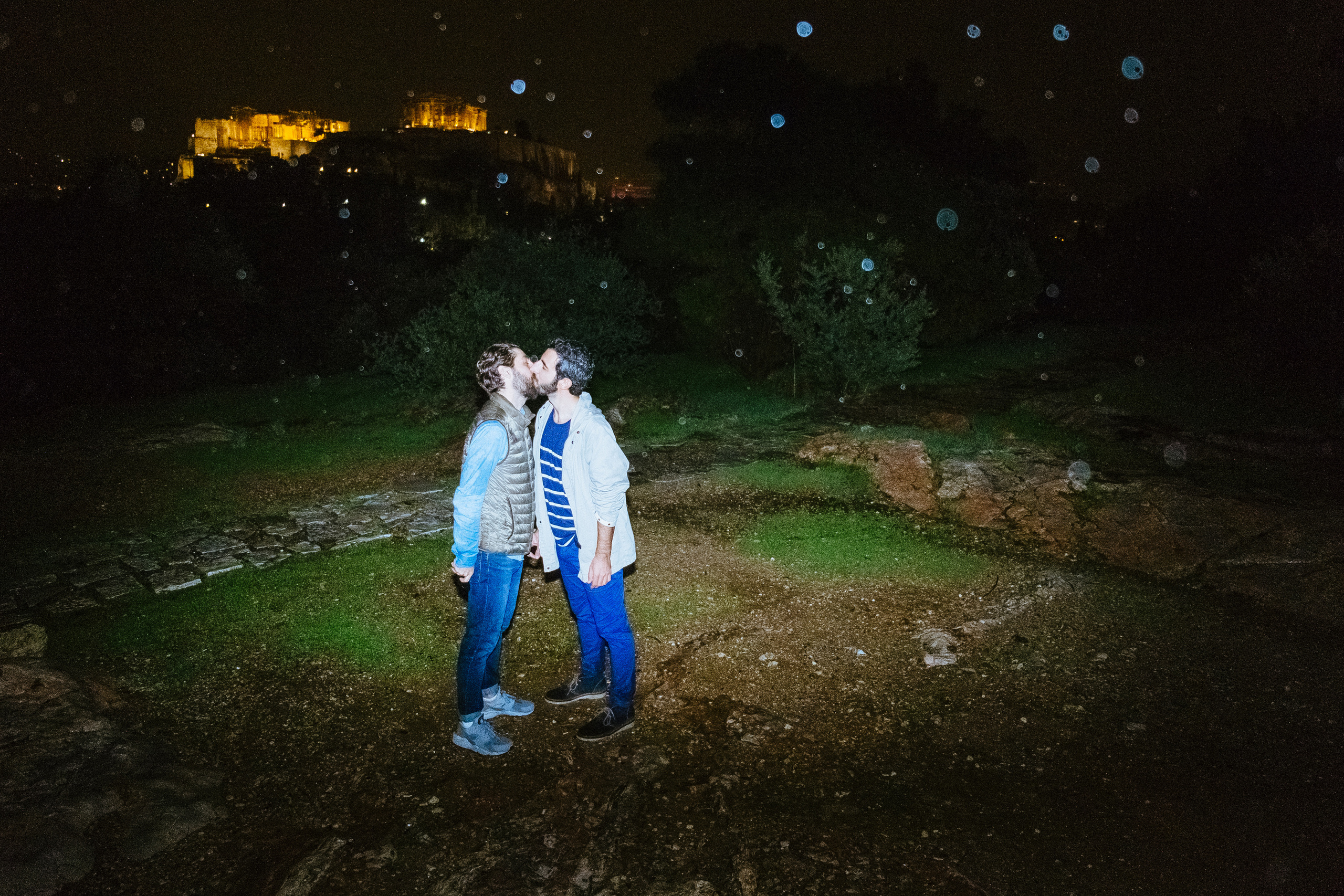 Andreas and Alex, 32 years and 32 years old, GreeceAndreas and Alex chose the top of Philopappou Hill (also known as Mouseion) overlooking theAcropolis in Athens.If we could travel in time, we’d choose the antiquity, when people were more open in manifesting theirattitudes to beauty, love and sex. They valued the beauty of the human body. Nakedness was notconsidered shameful. In my fantasies, we would like to make love in an ancient temple. Having surviveduntil our times, they remind us of the ancient way of life, of people’s attitude towards gods andtowards each other. For me it would be something like starting a time machine.