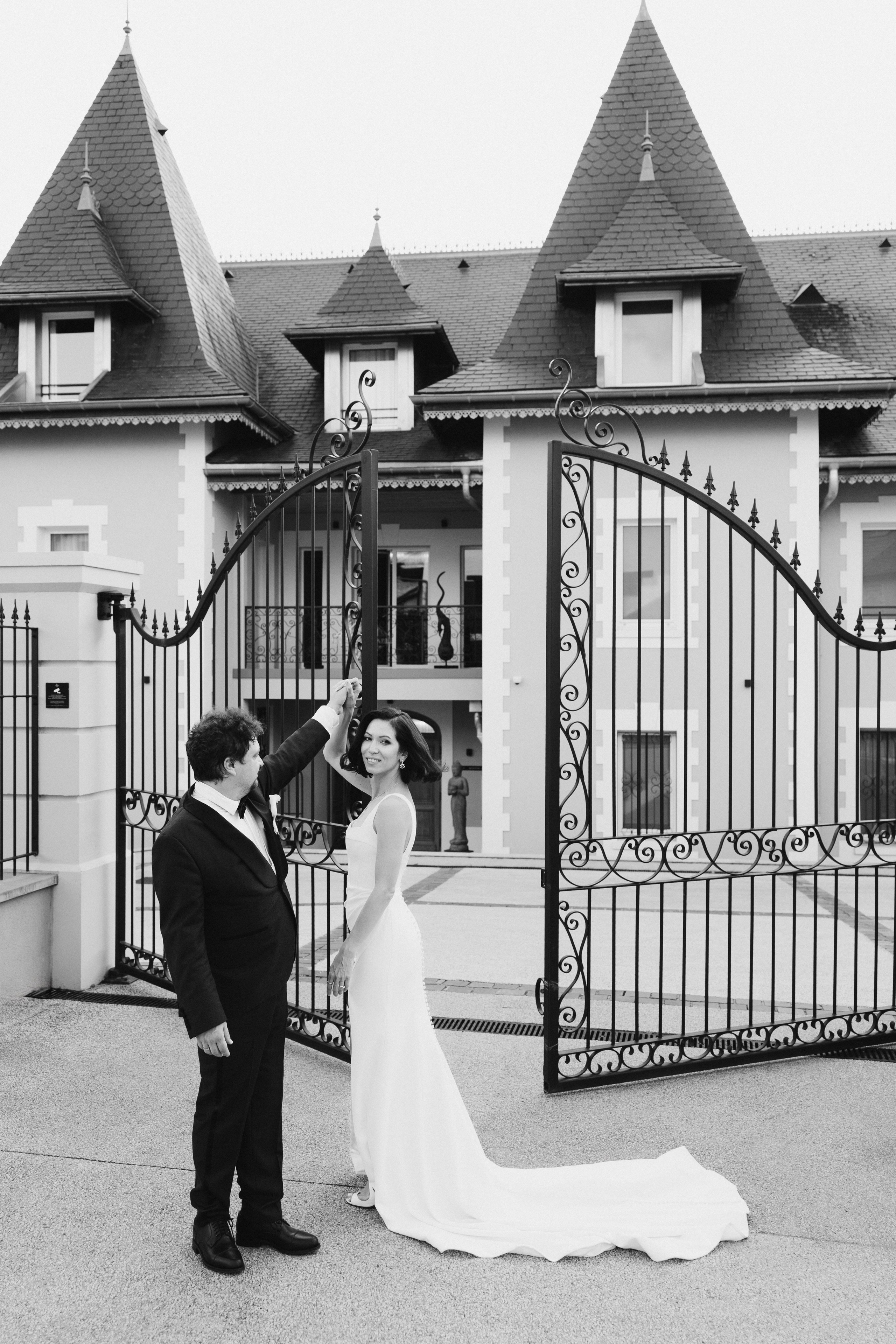 Editorial wedding portrait of bride and groom by pool at destination wedding