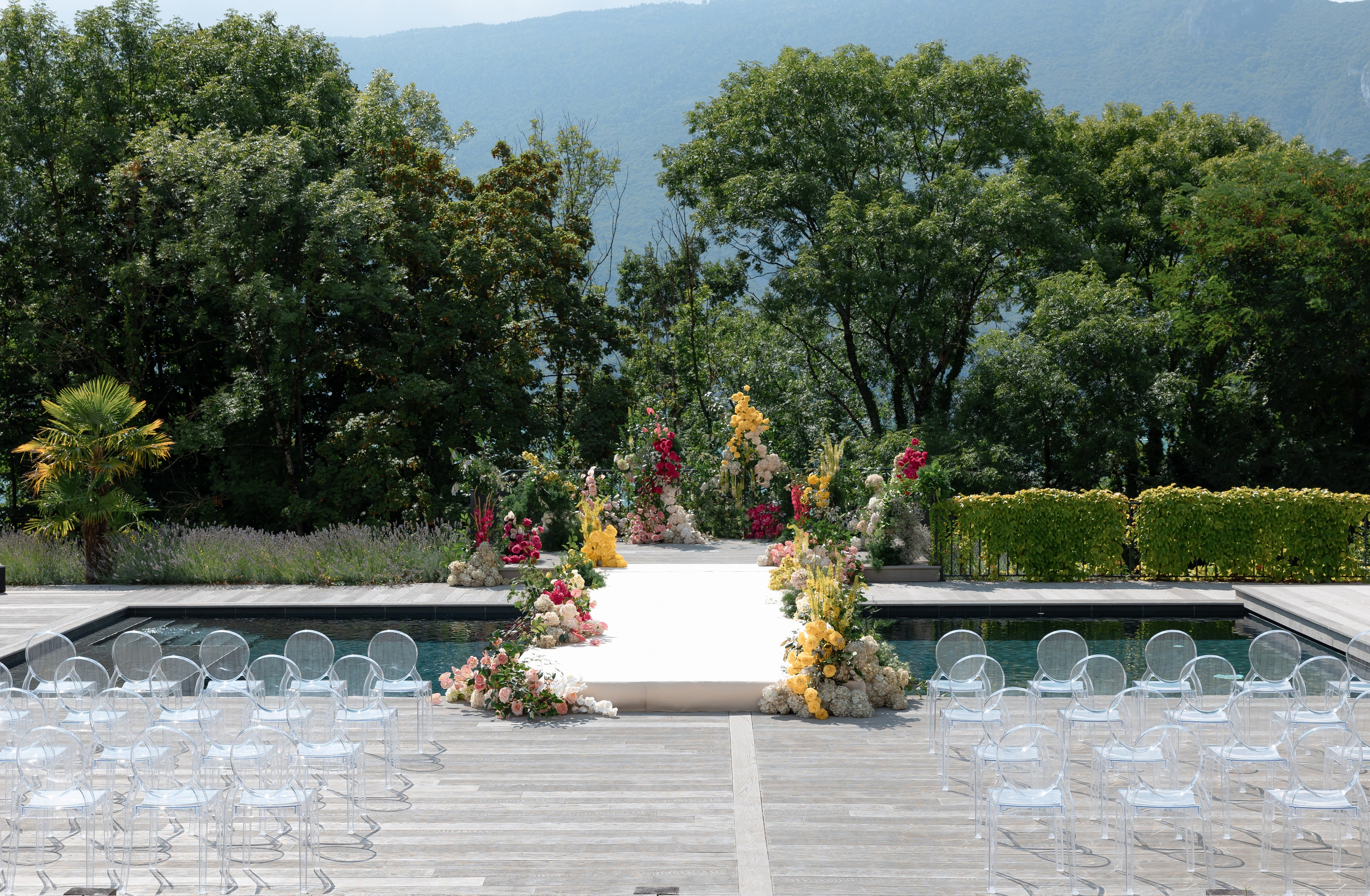 Luxury outdoor wedding ceremony design with floral decor in European venue