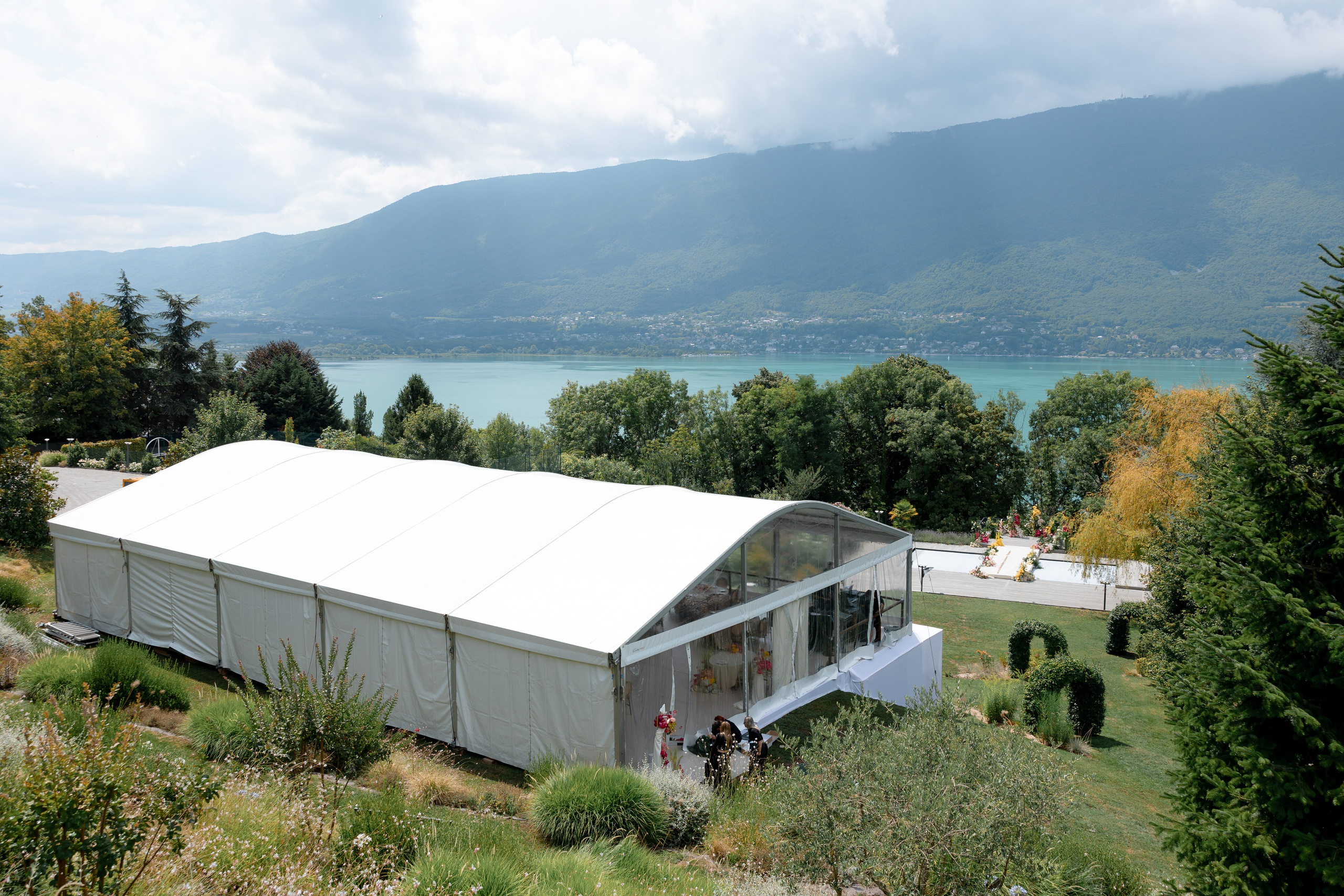 Luxury outdoor wedding ceremony design with floral decor in European venue