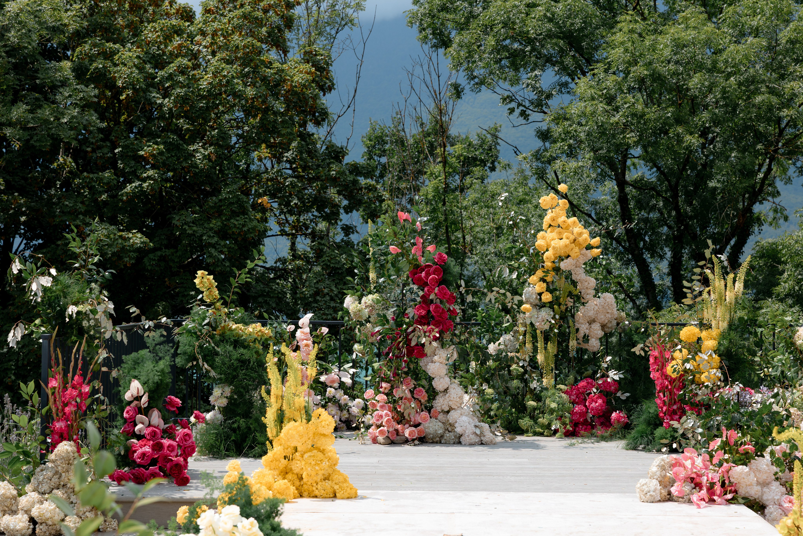 Luxury outdoor wedding ceremony design with floral decor in European venue