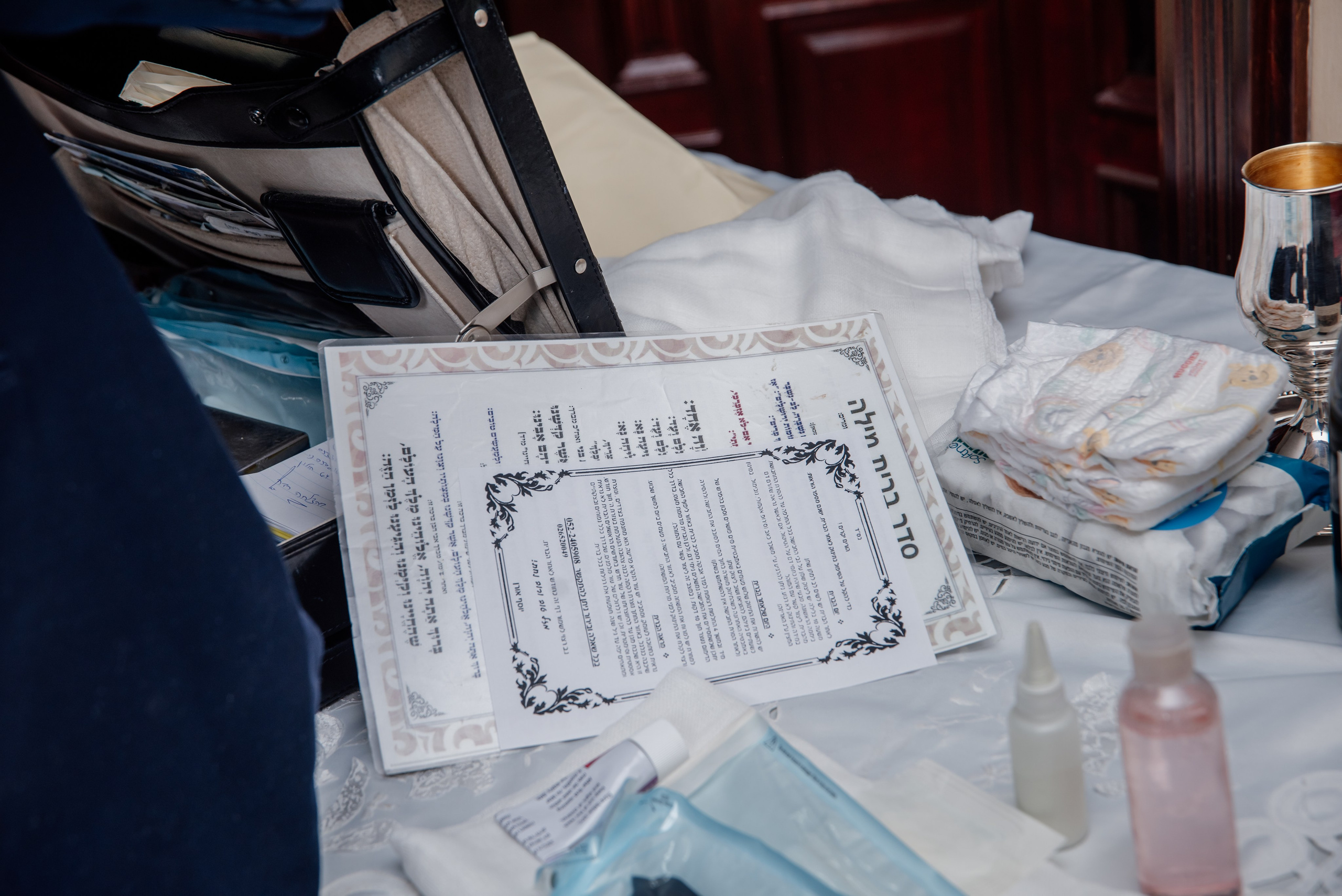 ברית מילה. צלמת ירושלים תל אביב ישראל