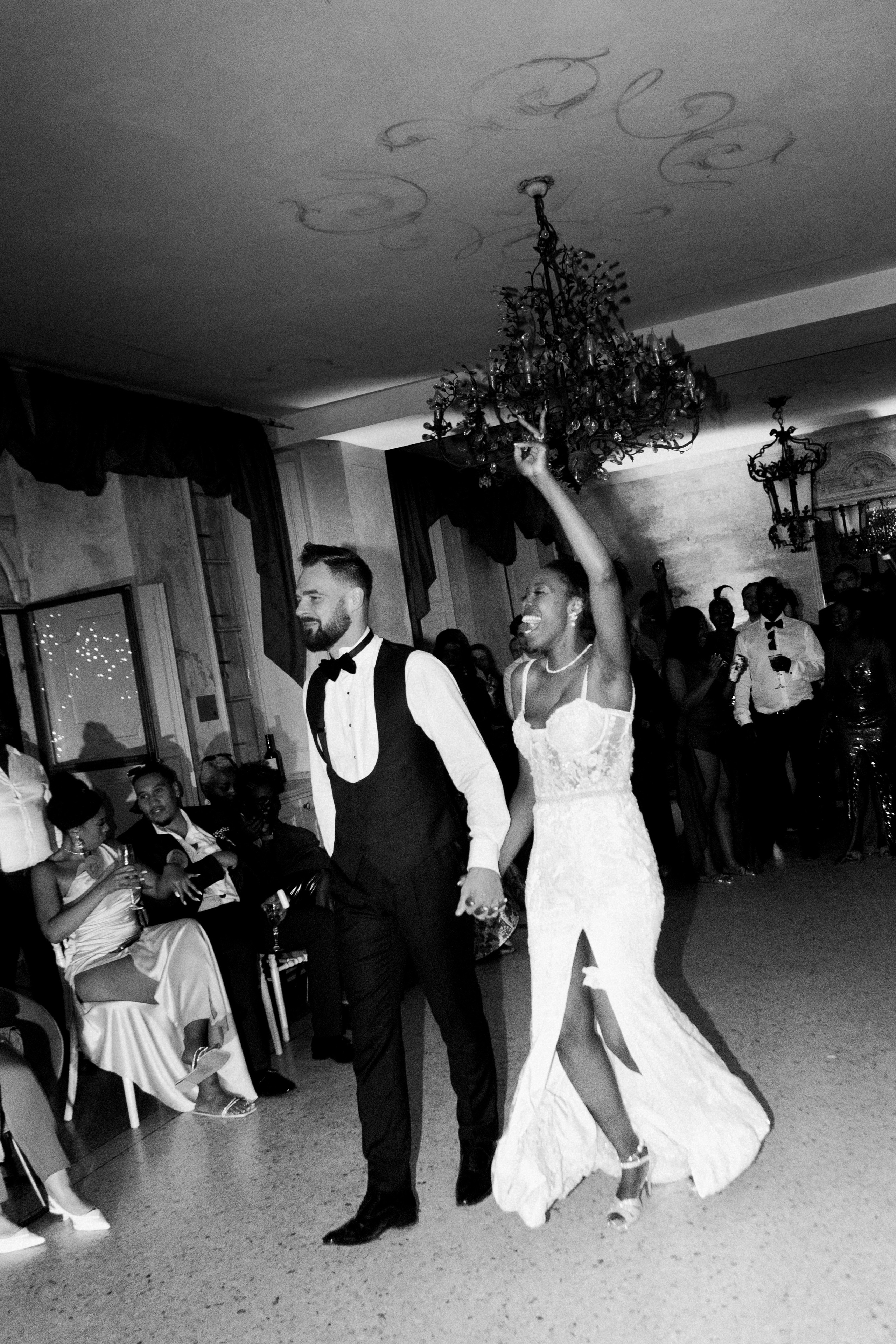 Intimate candid moment of the bride and groom dancing together during their wedding celebration in Como lake 
