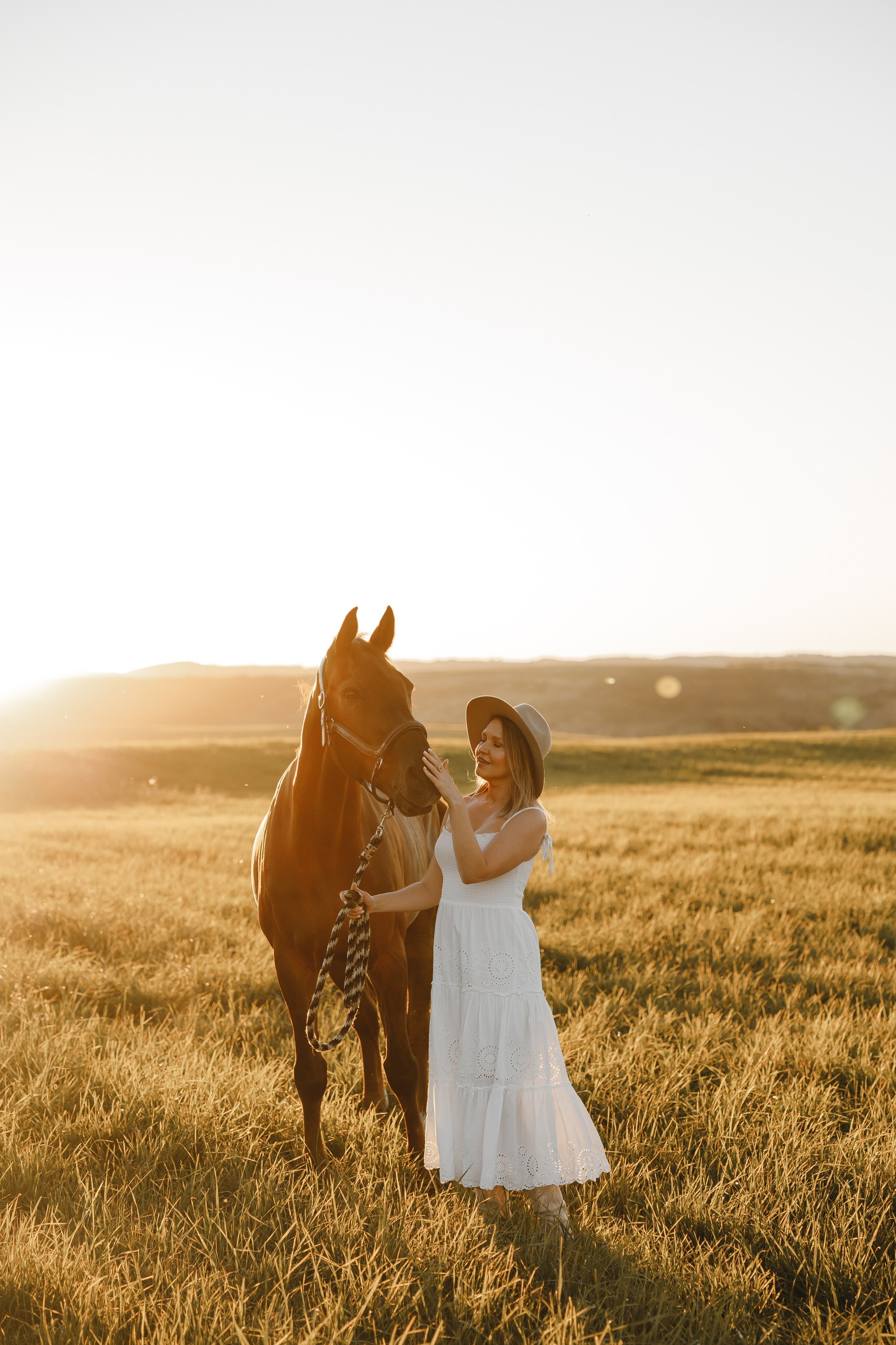 Maria. Sunset photoshoot with hourse