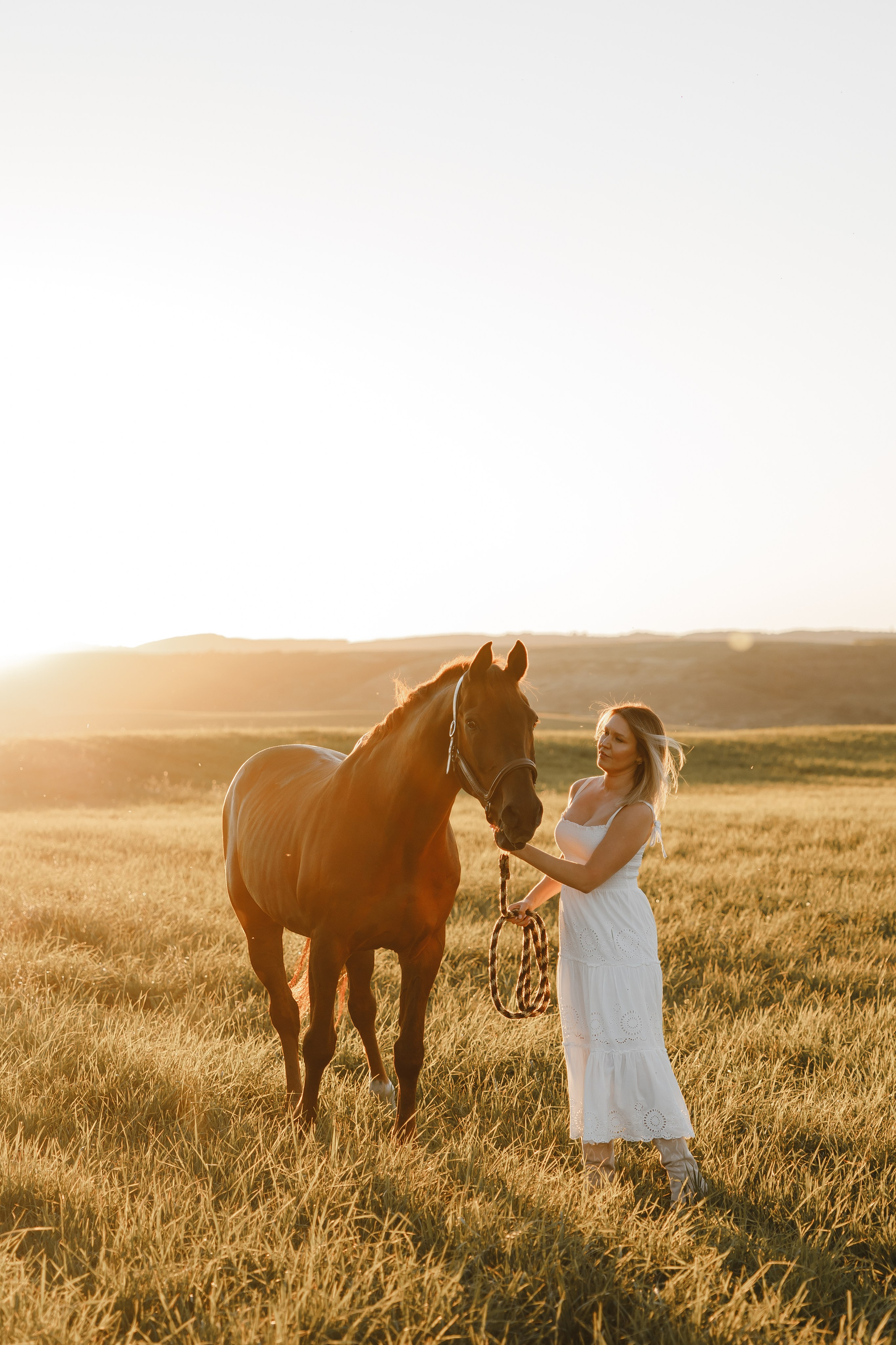 Maria. Sunset photoshoot with hourse