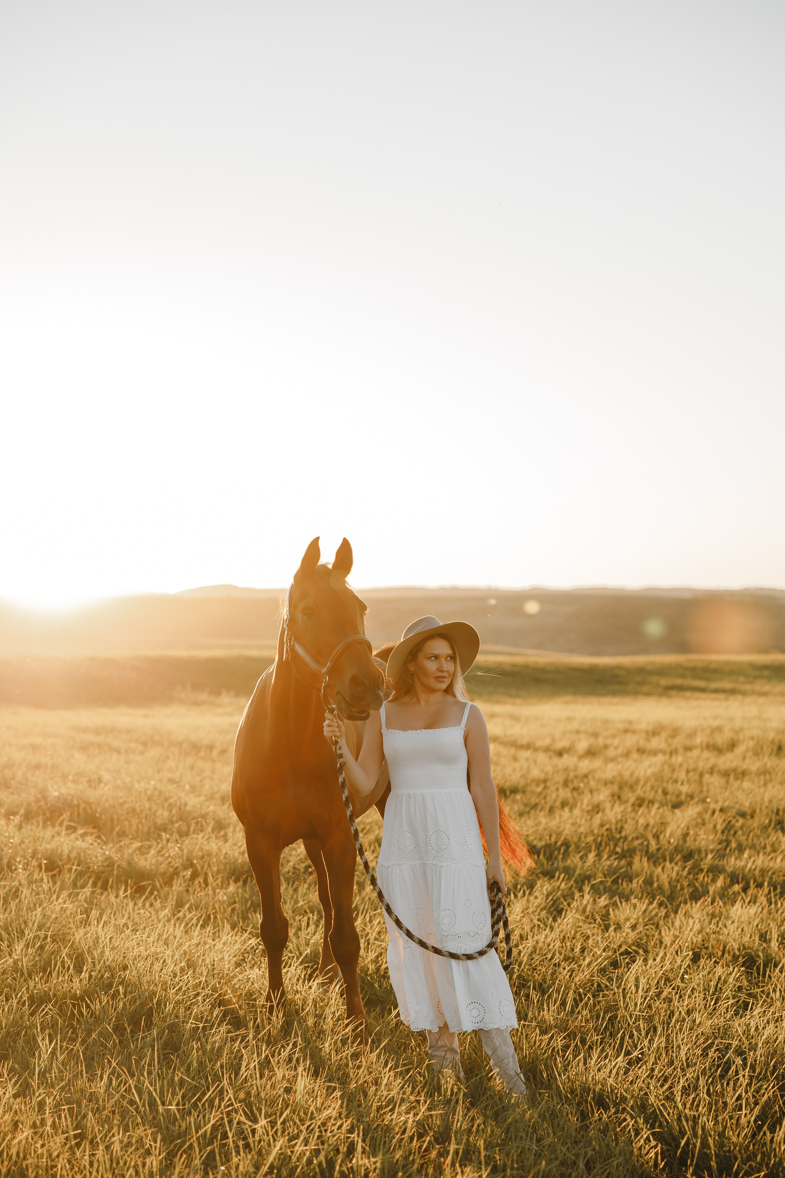 Maria. Sunset photoshoot with hourse
