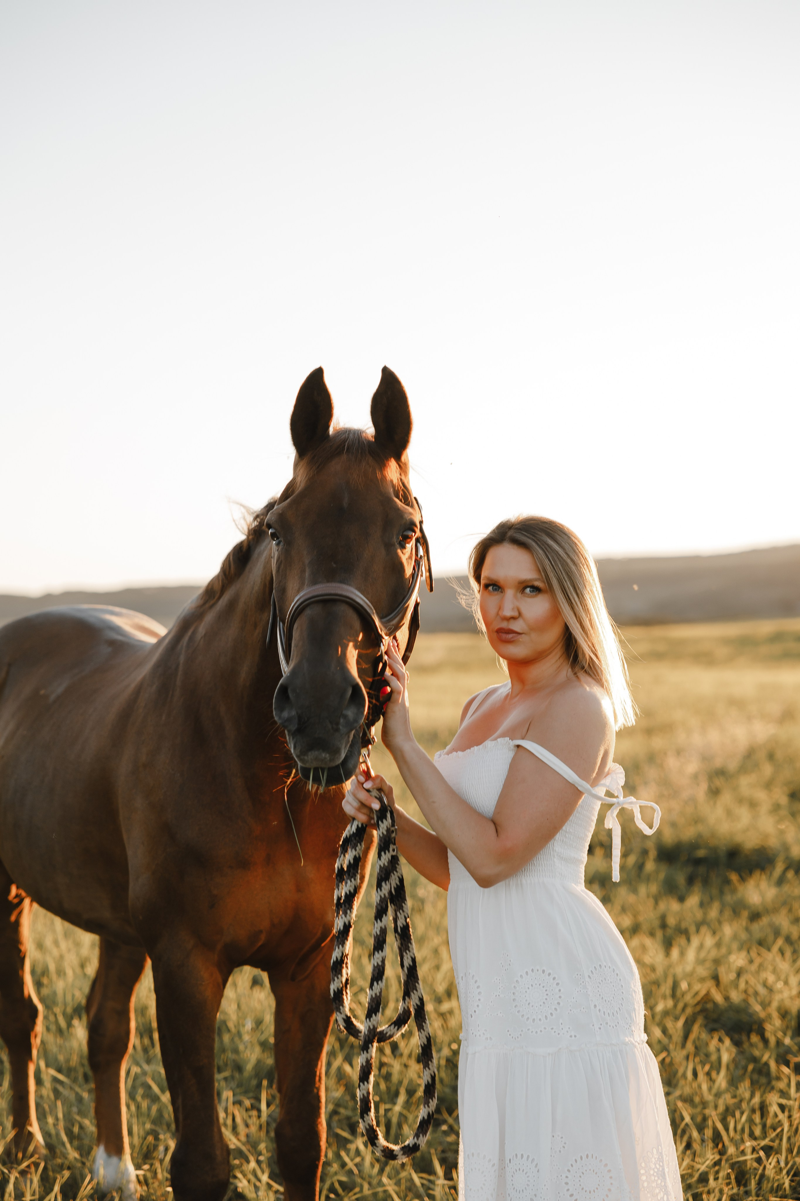 Maria. Sunset photoshoot with hourse