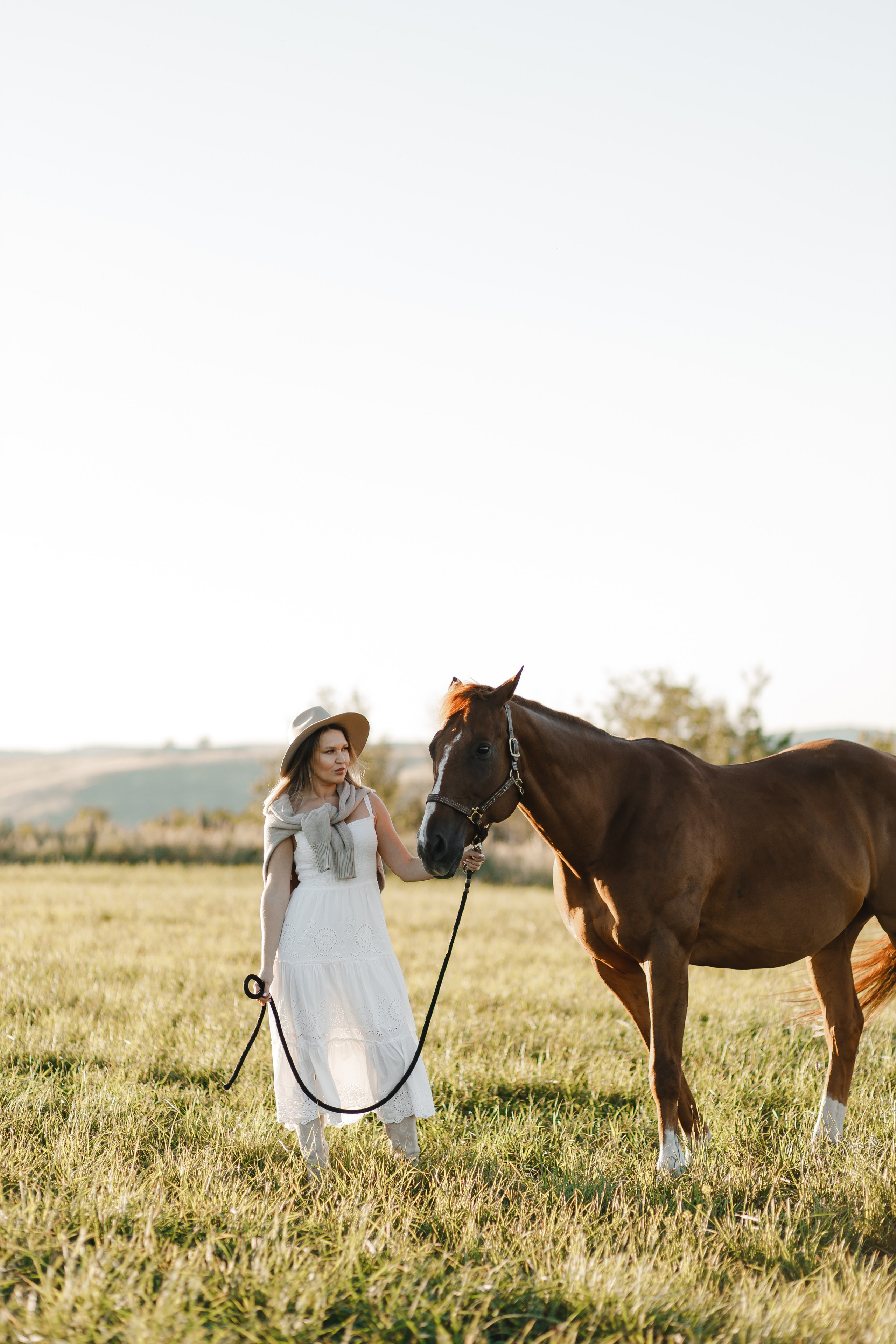 Maria. Sunset photoshoot with hourse