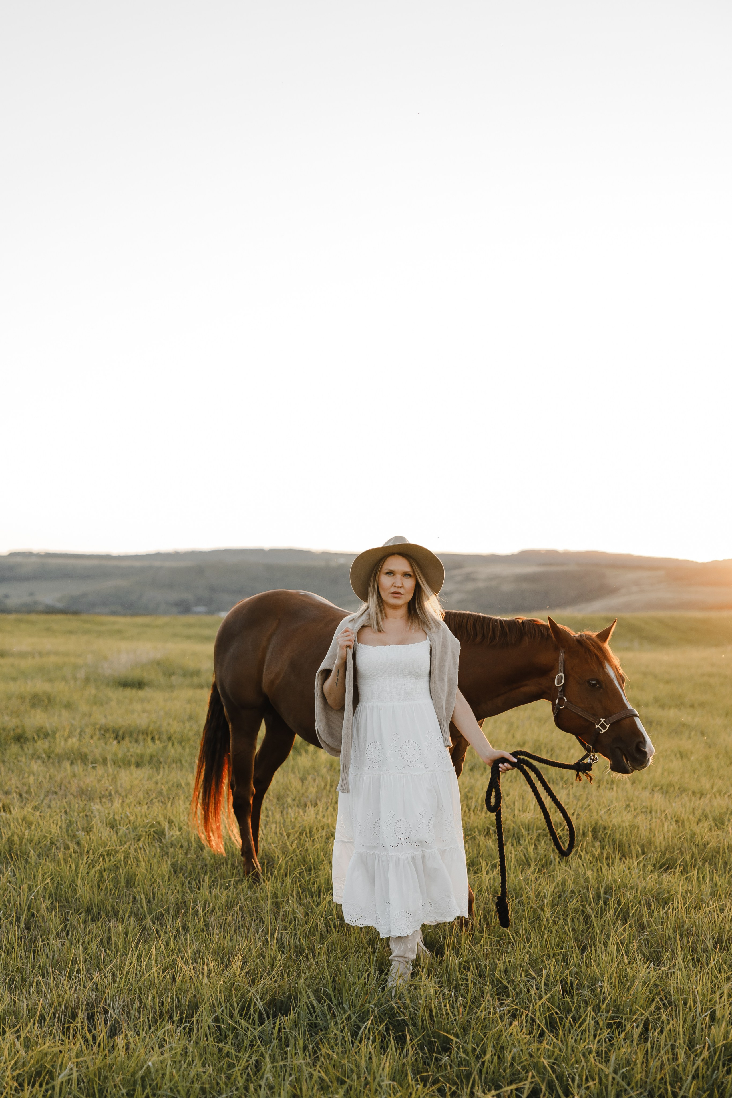 Maria. Sunset photoshoot with hourse