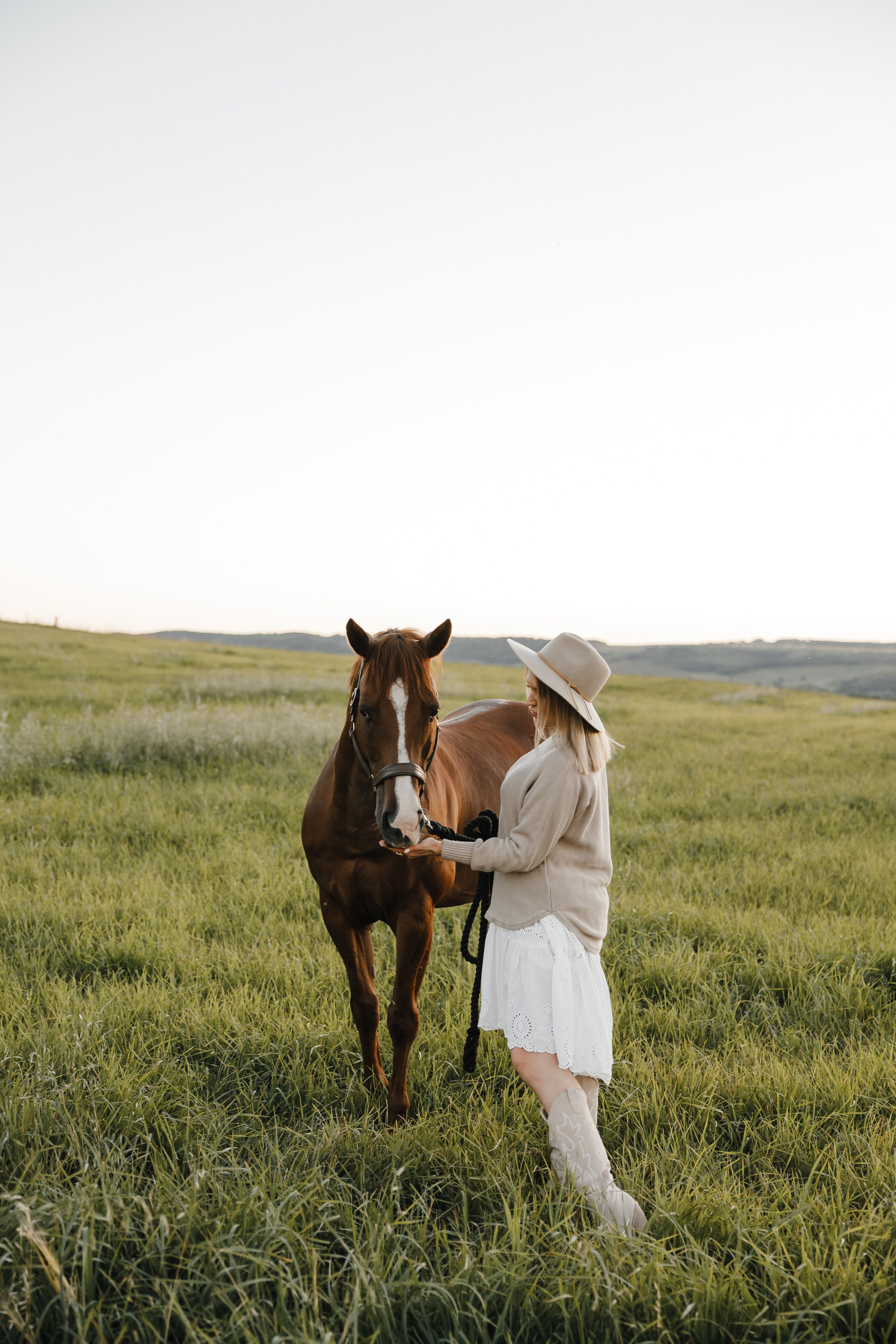 Maria. Sunset photoshoot with hourse