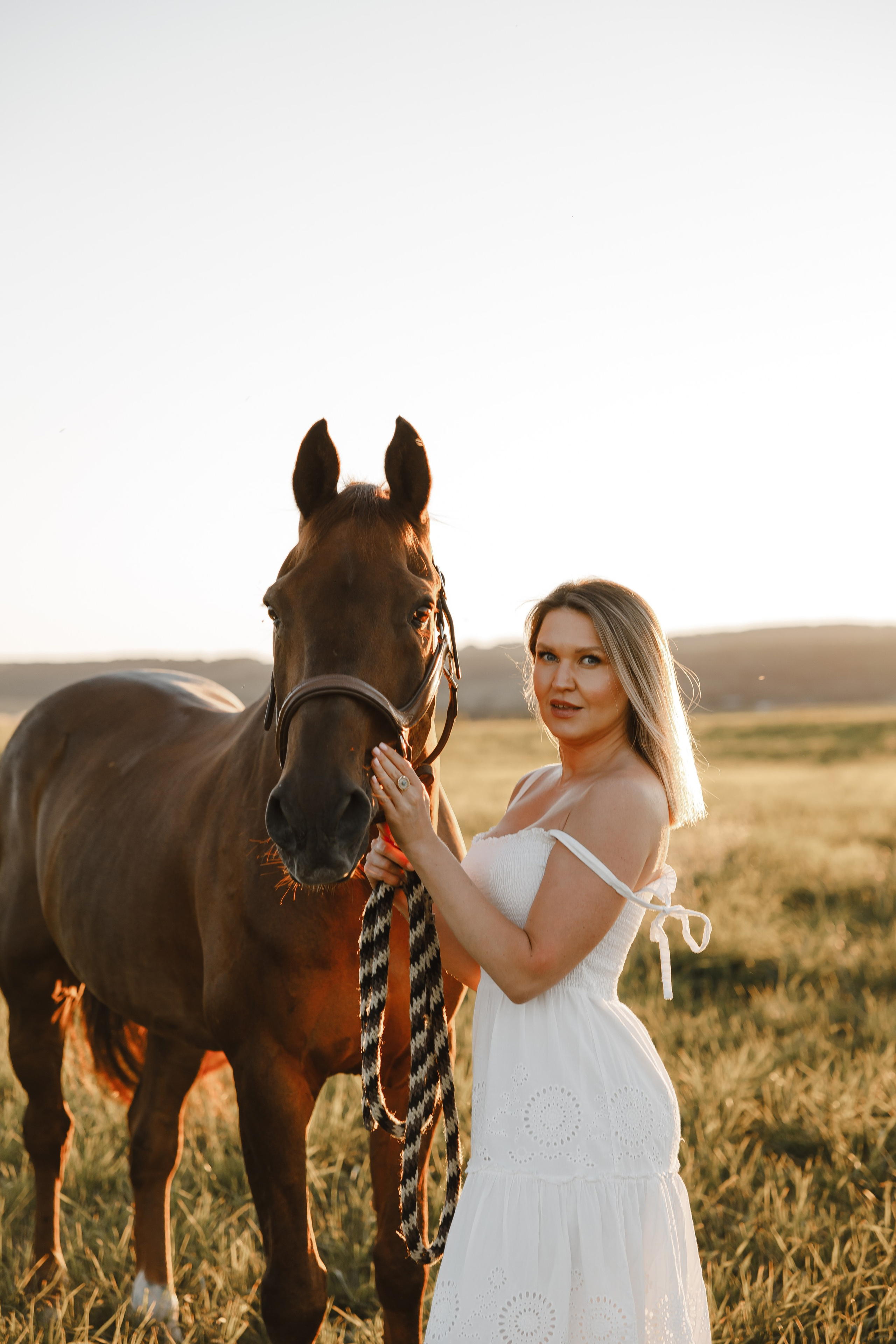 Maria. Sunset photoshoot with hourse