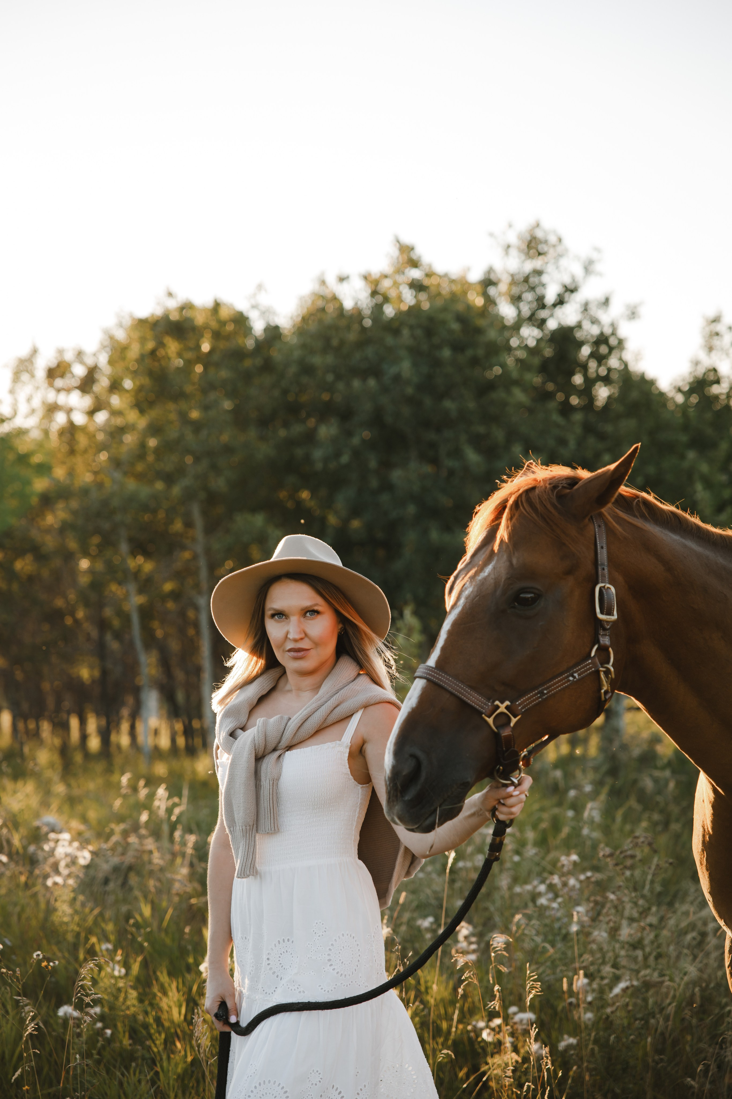 Maria. Sunset photoshoot with hourse