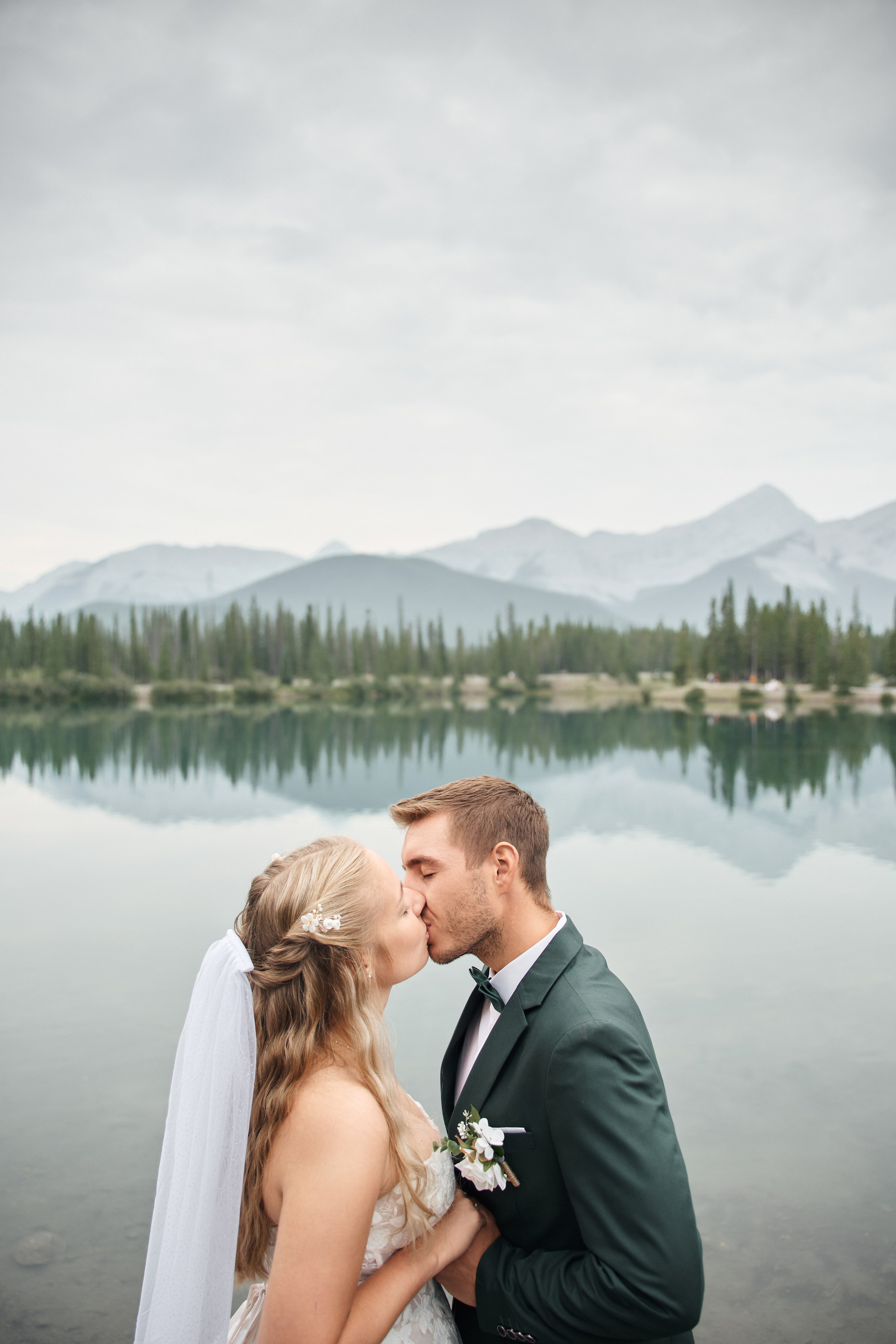 Natalie&Mat. A small, intimate wedding at Forgetmenot Lake, Kananaskis Park. Calgary wedding photographer. Andrii Bielikov
