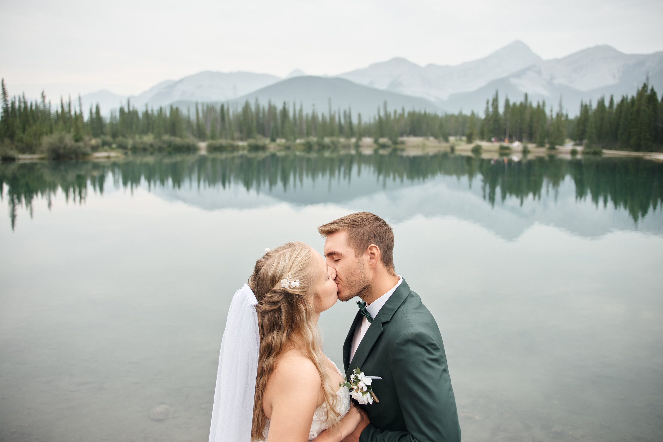 Natalie&Mat. A small, intimate wedding at Forgetmenot Lake, Kananaskis Park. Calgary wedding photographer. Andrii Bielikov