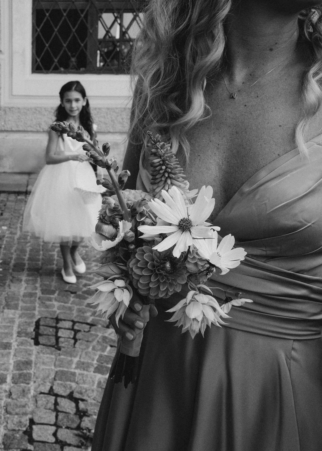 Black and white bridal bouquet held during wedding portraits