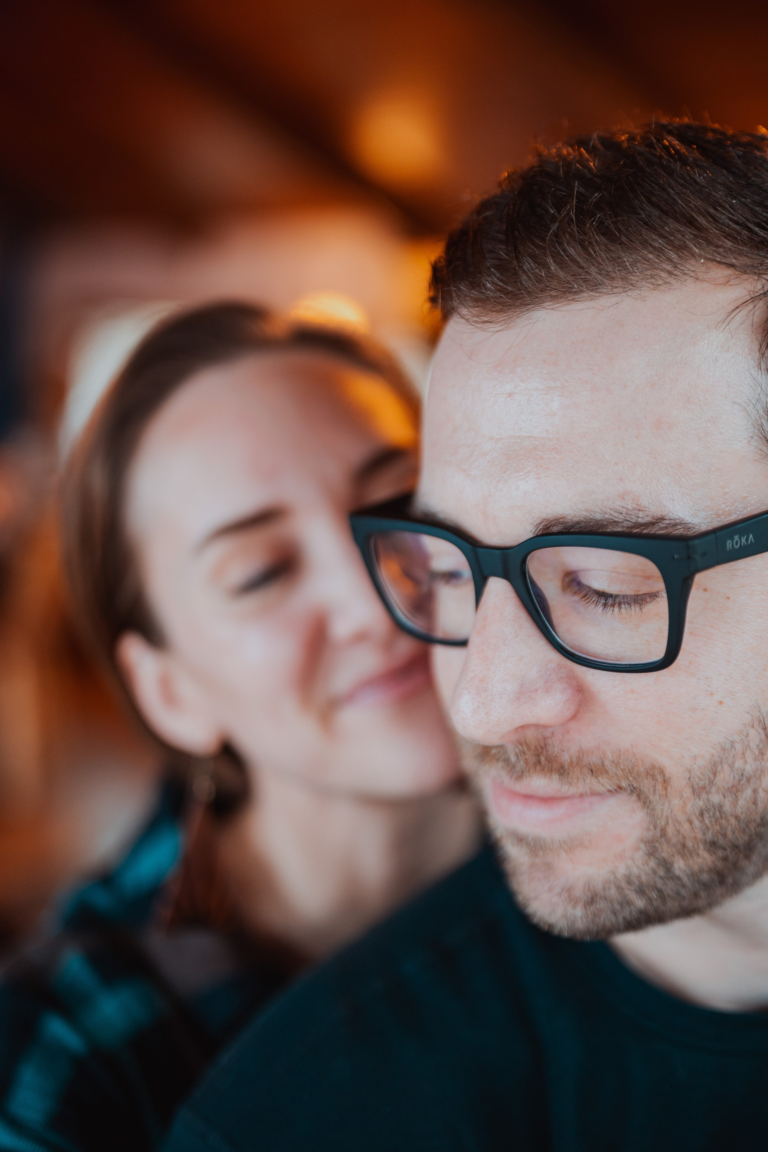 Intimate couples and maternity photography in Green Bay, Wisconsin. Professional portrait photographer Ilia Bordiugov specializing in natural, emotional couple connections and expecting parents.