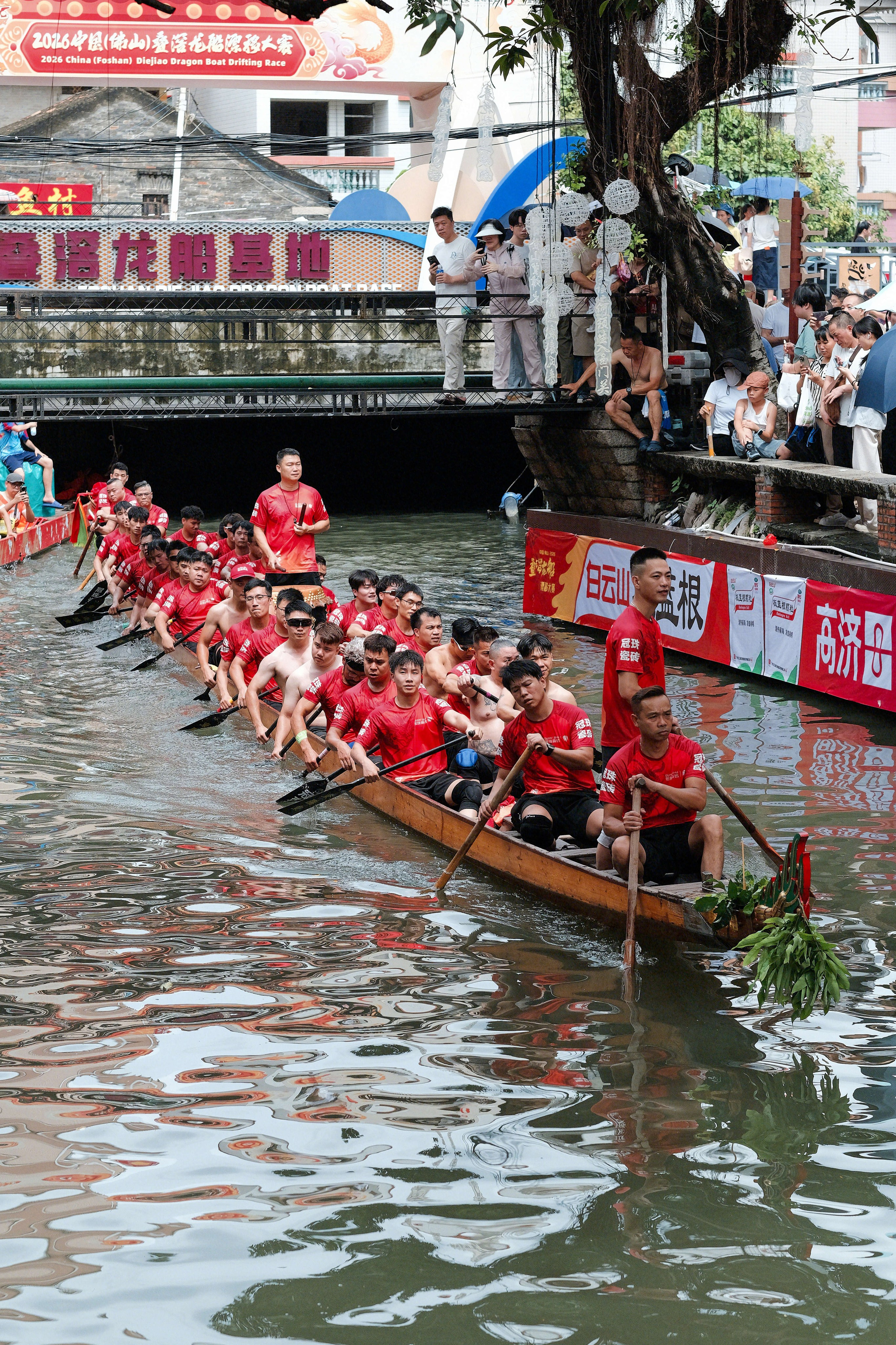 Dragon Boat Festival Foshan China photography showing traditional dragon boat races, rowing teams, local culture, and spectators during the annual Duanwu Festival in Guangdong Province.